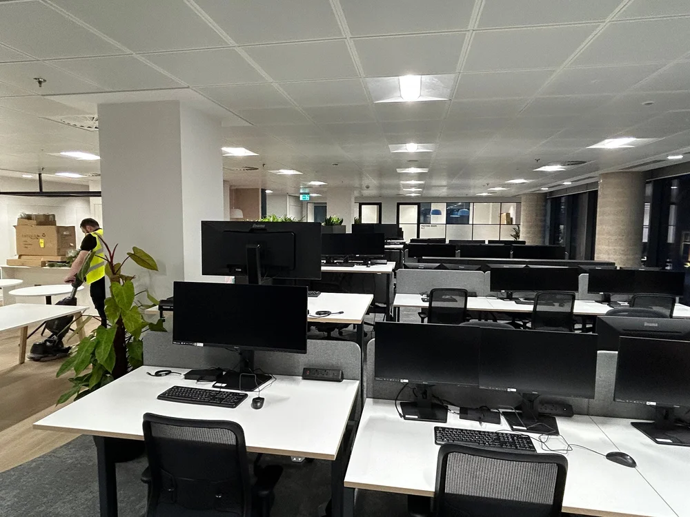 Prime cleaner at work in an open-plan office