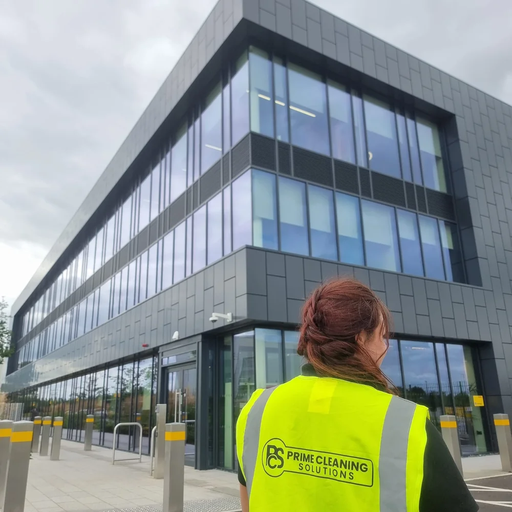 Prime team member outside a client office building
