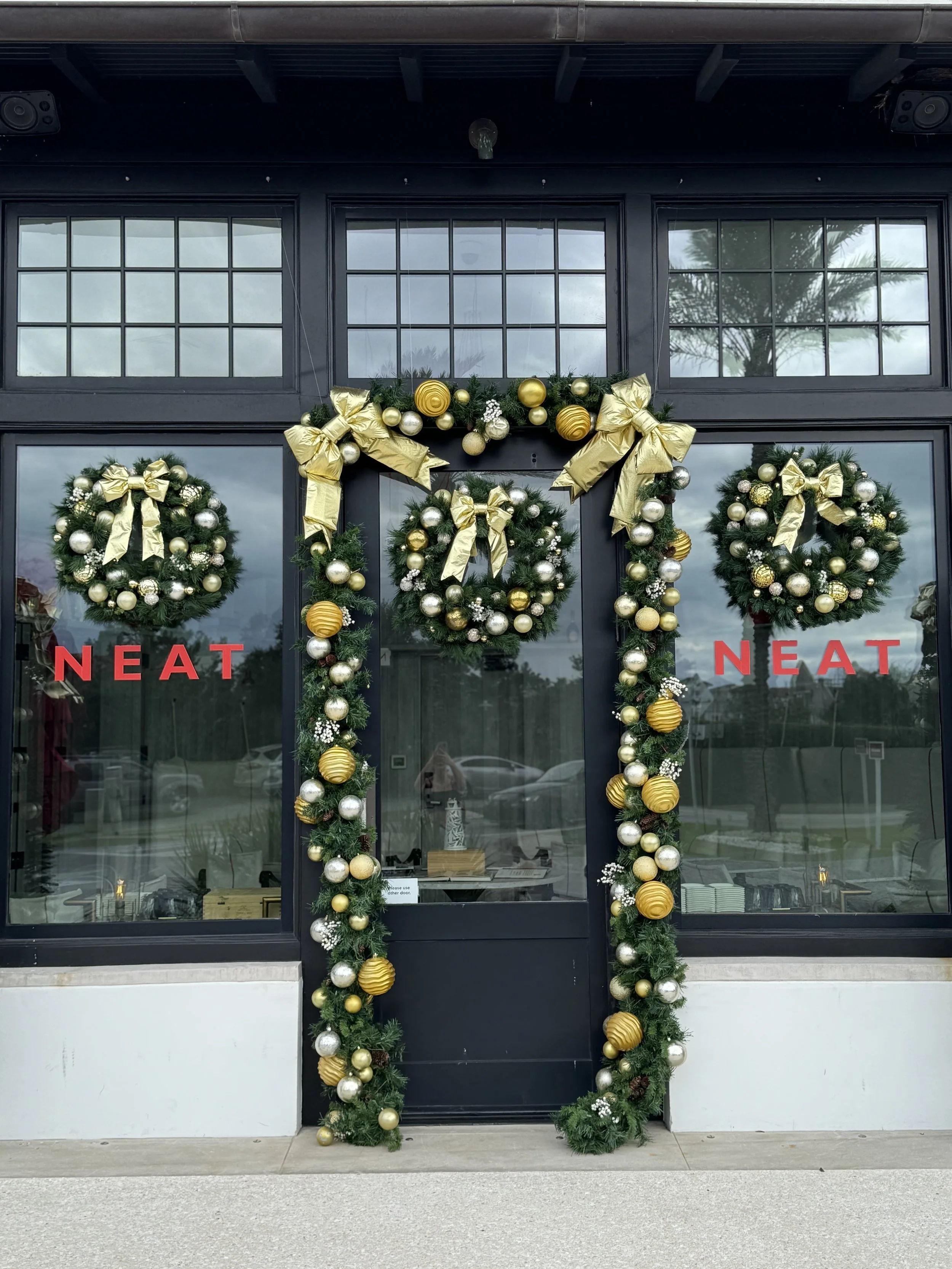NEAT bottle shop in Alys Beach decorated for the holidays with Christmas decor near Oyster Manor
