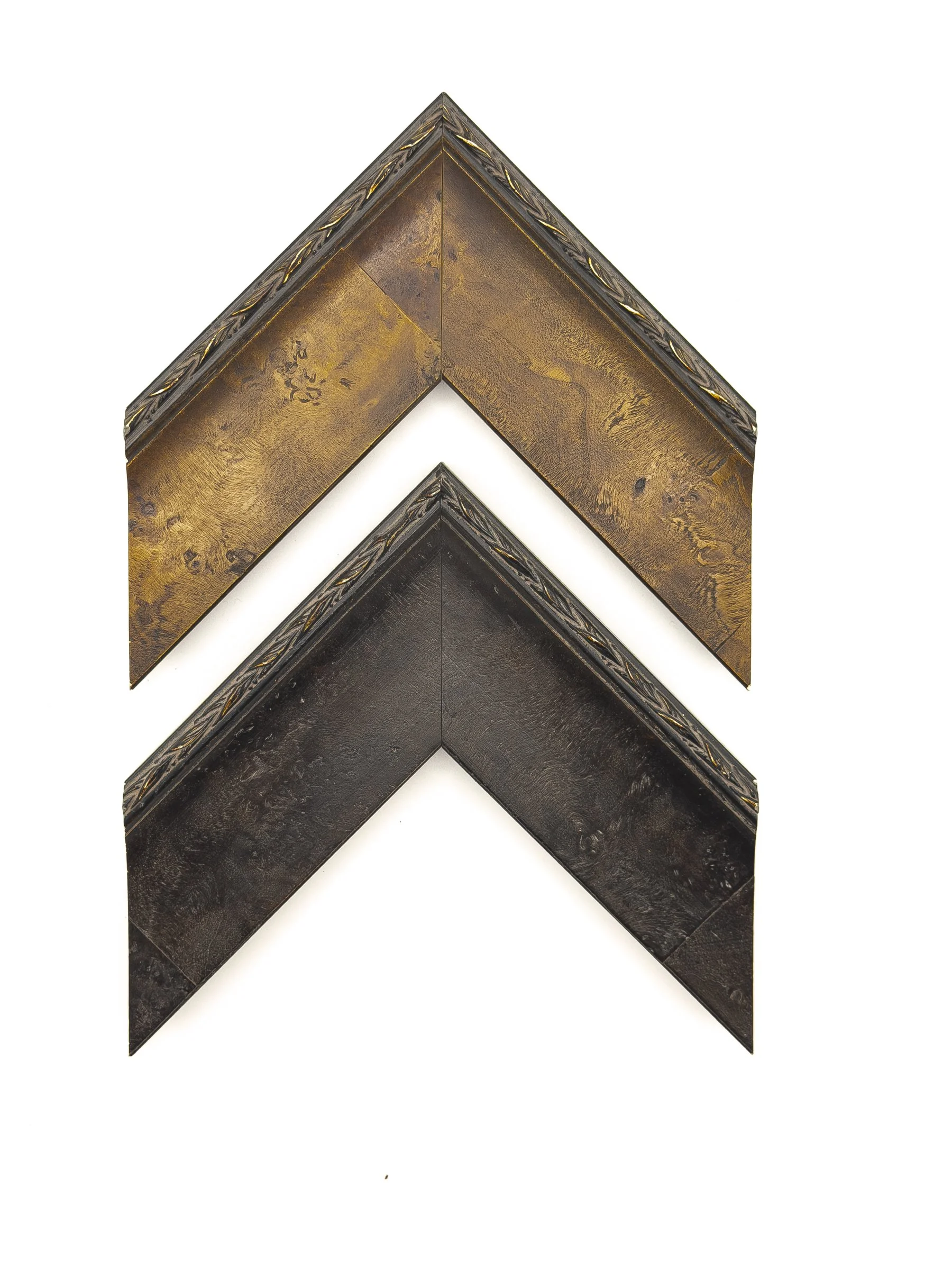 Elegant picture frame moulding with a wide, gently sloped profile, richly textured surface, and ornate leaf-patterned outer edge, shown in warm antique gold and deep espresso finishes. Available for custom framing in Wichita, KS at Dock 410, this sop