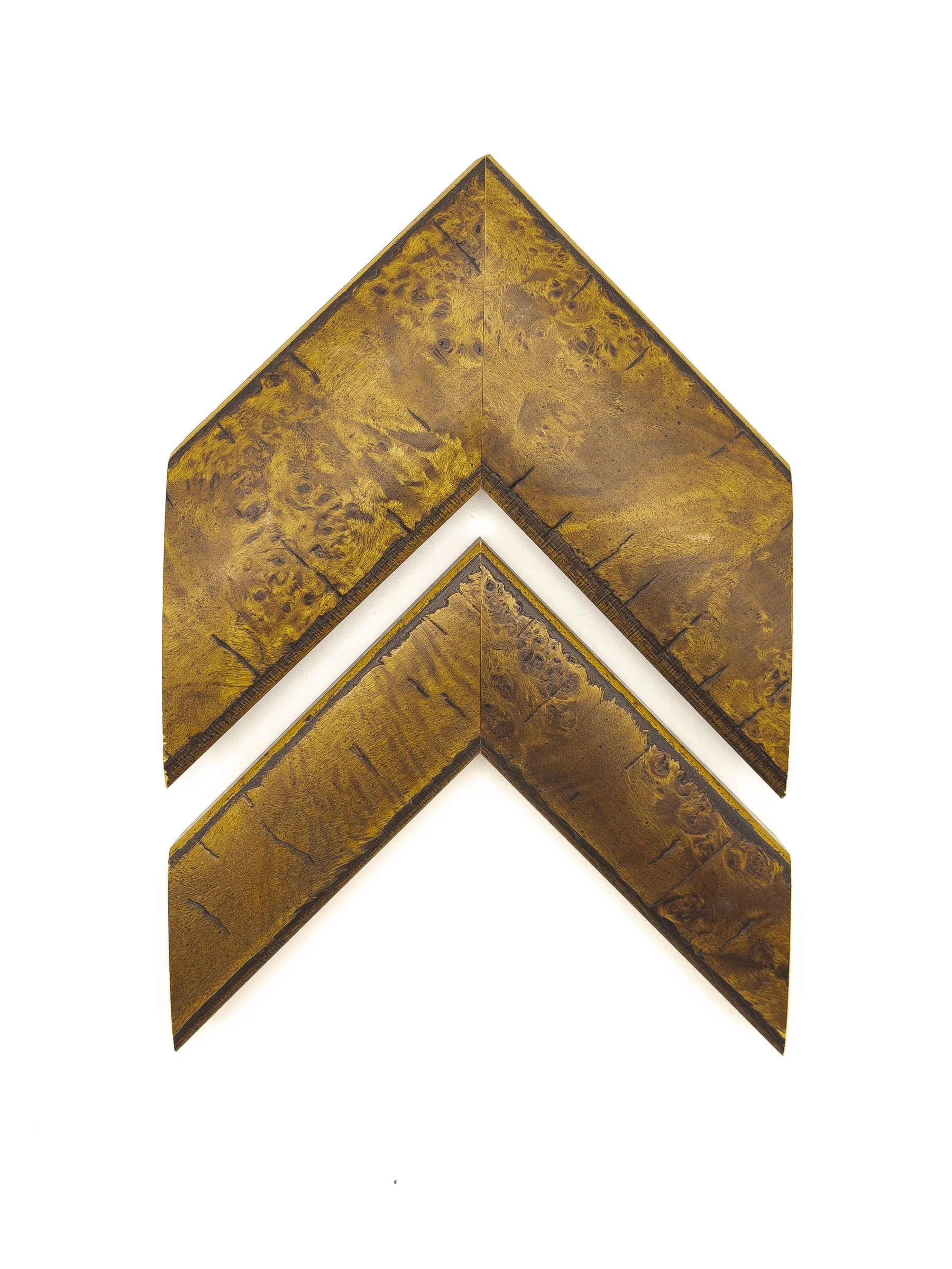 Rich golden-brown burl wood picture frame moulding with dramatic natural grain and a refined, handcrafted appearance. Available for custom framing in Wichita, KS at Dock 410, this distinctive moulding is ideal for fine art, photography, mirrors, and 