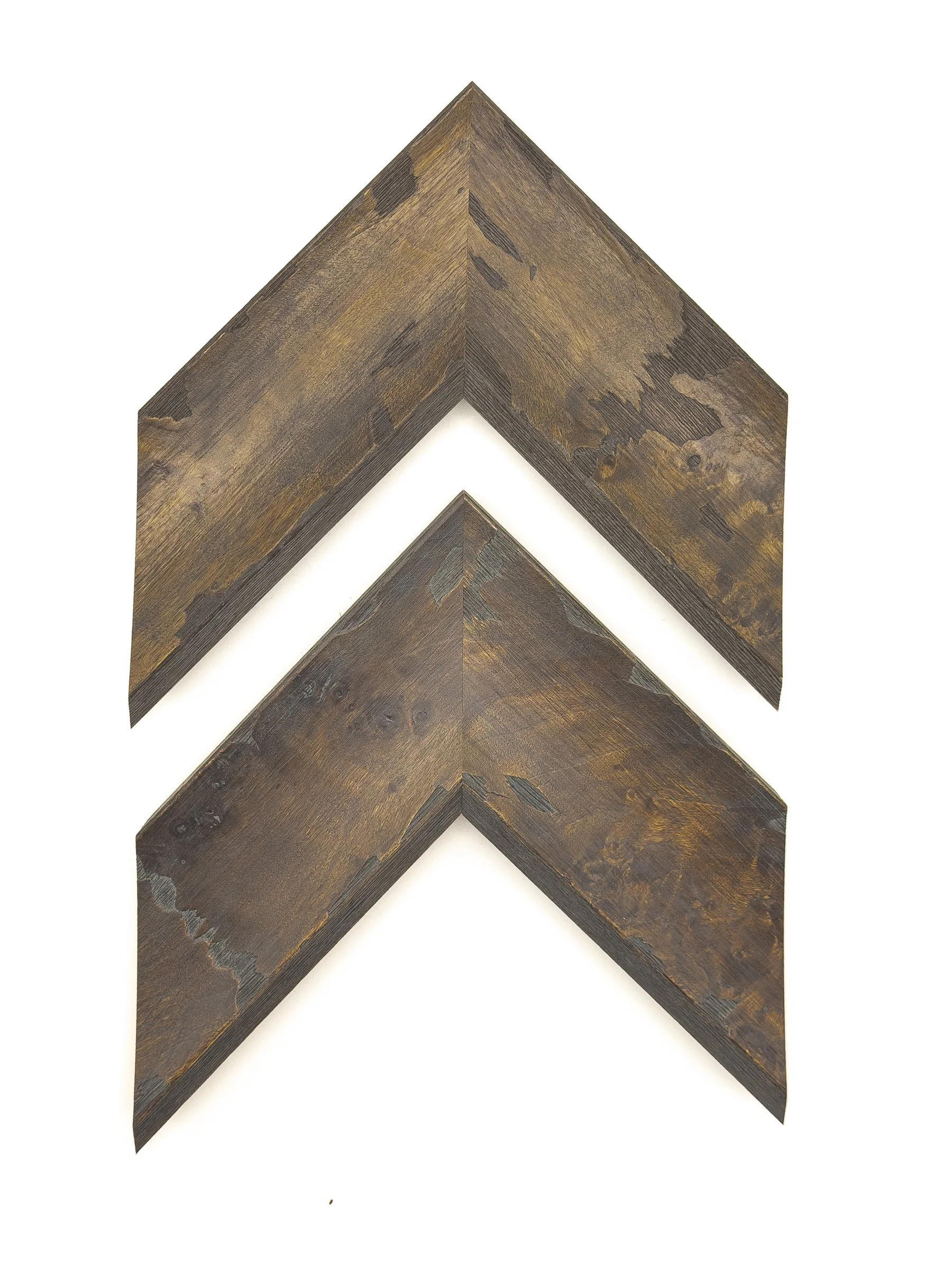 Warm brown picture frame moulding with a broad profile, distressed wood texture, and rich variations of bronze, amber, and charcoal. Available for custom framing in Wichita, KS at Dock 410, this rustic moulding pairs beautifully with landscapes, wild
