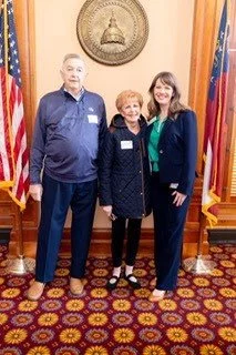 Rep. Anulewicz poses with her mother and father-in-law at the State Capitol.