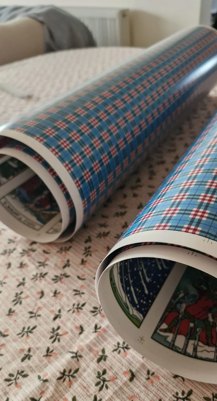 Winter Waite Glitter Edition tarot samples in the form of rolled up sheets.