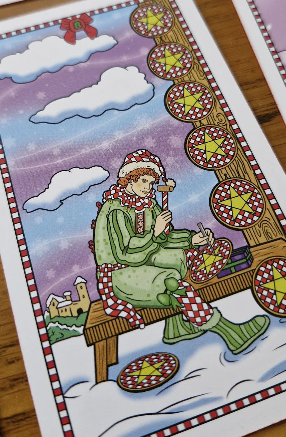 8-pentacles-winterland-christmas-tarot.jpg
