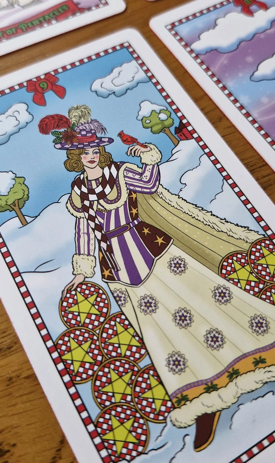 9-pentacles-christmas-winterland-tarot.jpg
