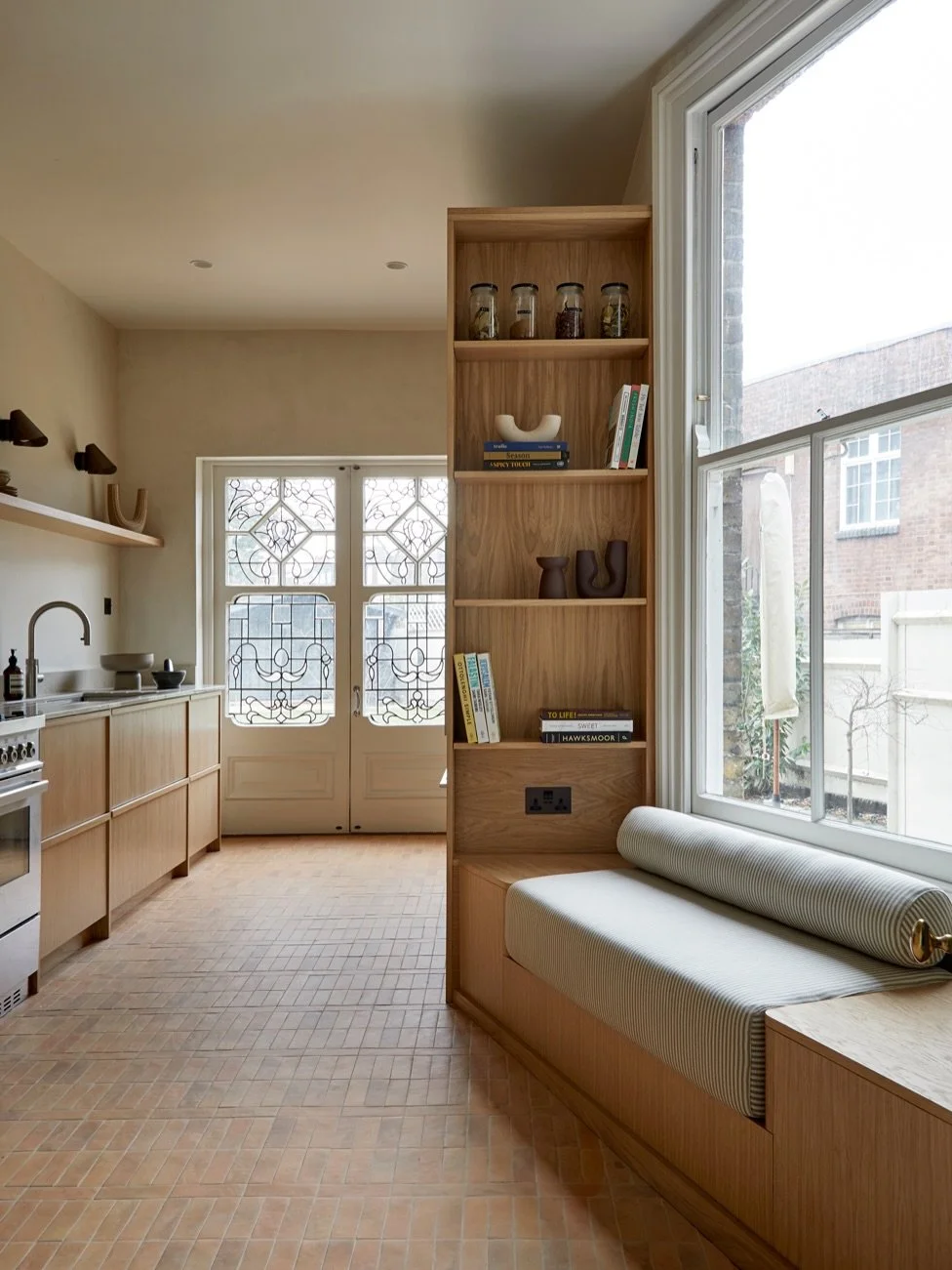 DESIGNED FOR REAL LIFE This isn&rsquo;t just a pretty bespoke meticulously designed kitchen. It answers both aesthetics and functions and slots into place in what was a tricky galley kitchen. The chef of the house gets the run of the space, there&rsq