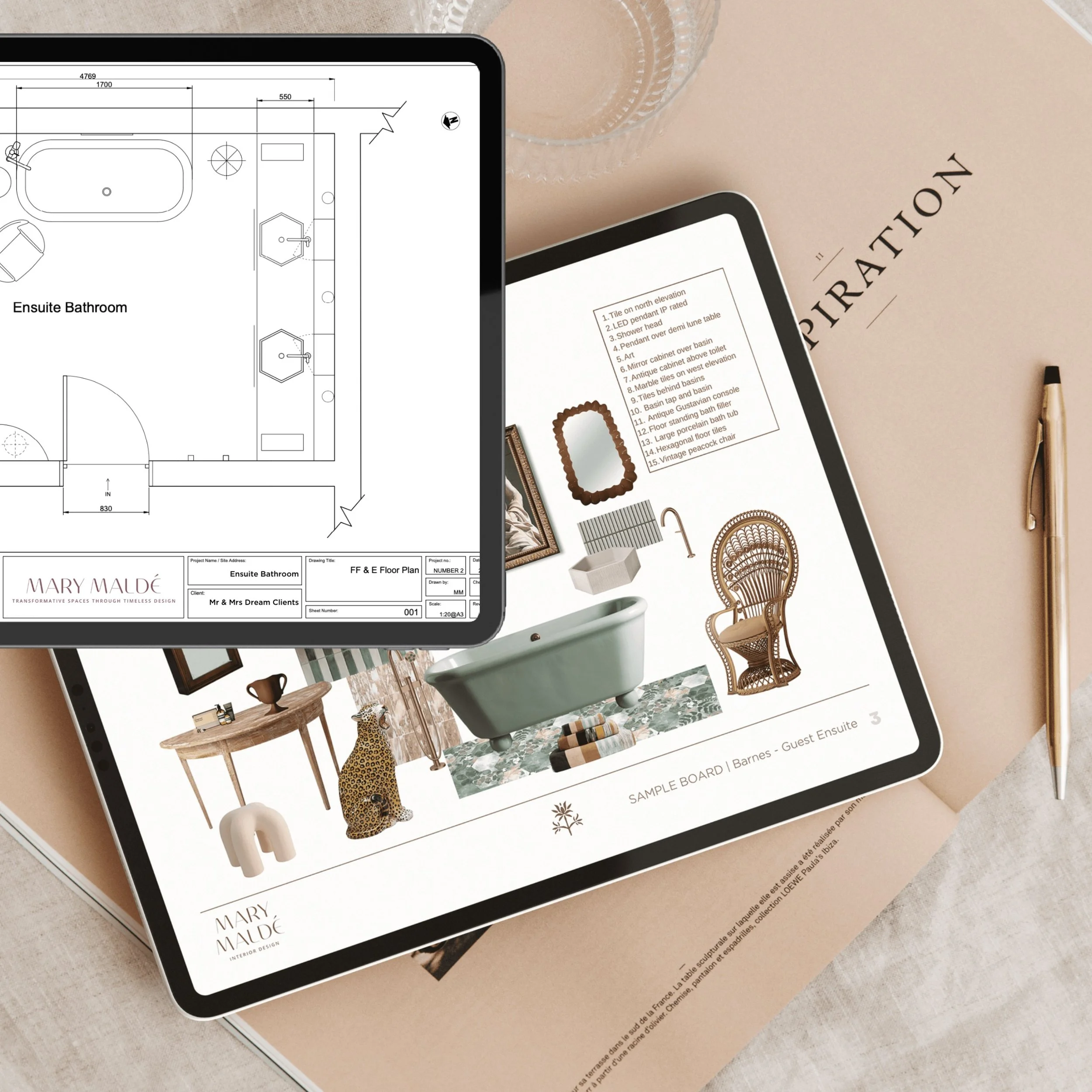 Two digital tablets displaying interior design project plans and images, placed on a light pink surface with a clear glass and a pen nearby.