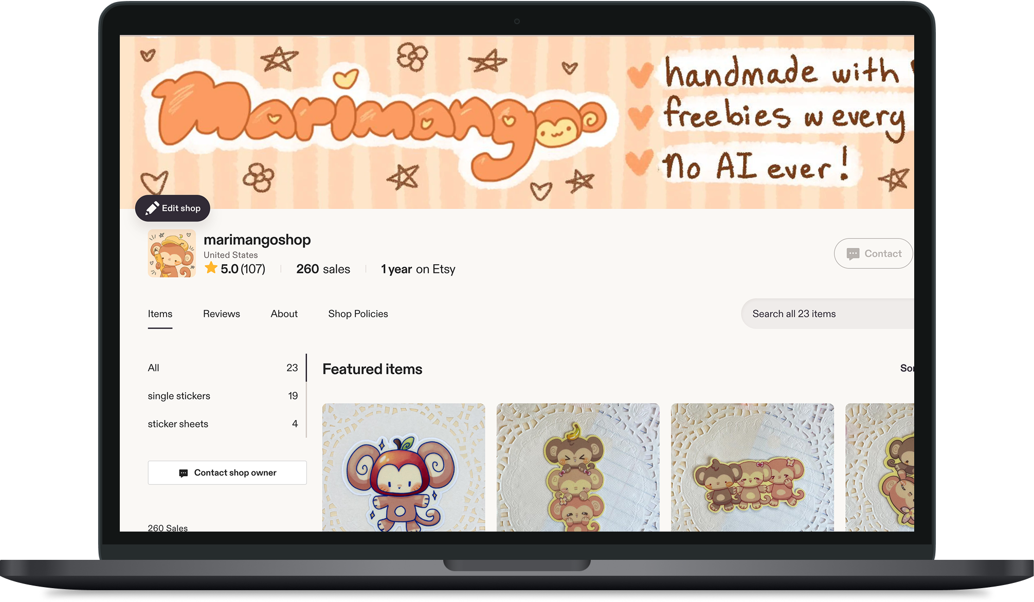 Etsy shop webpage for Marimangoshop featuring a banner with orange and brown cartoon monkeys and text about handmade stickers and freebies.
