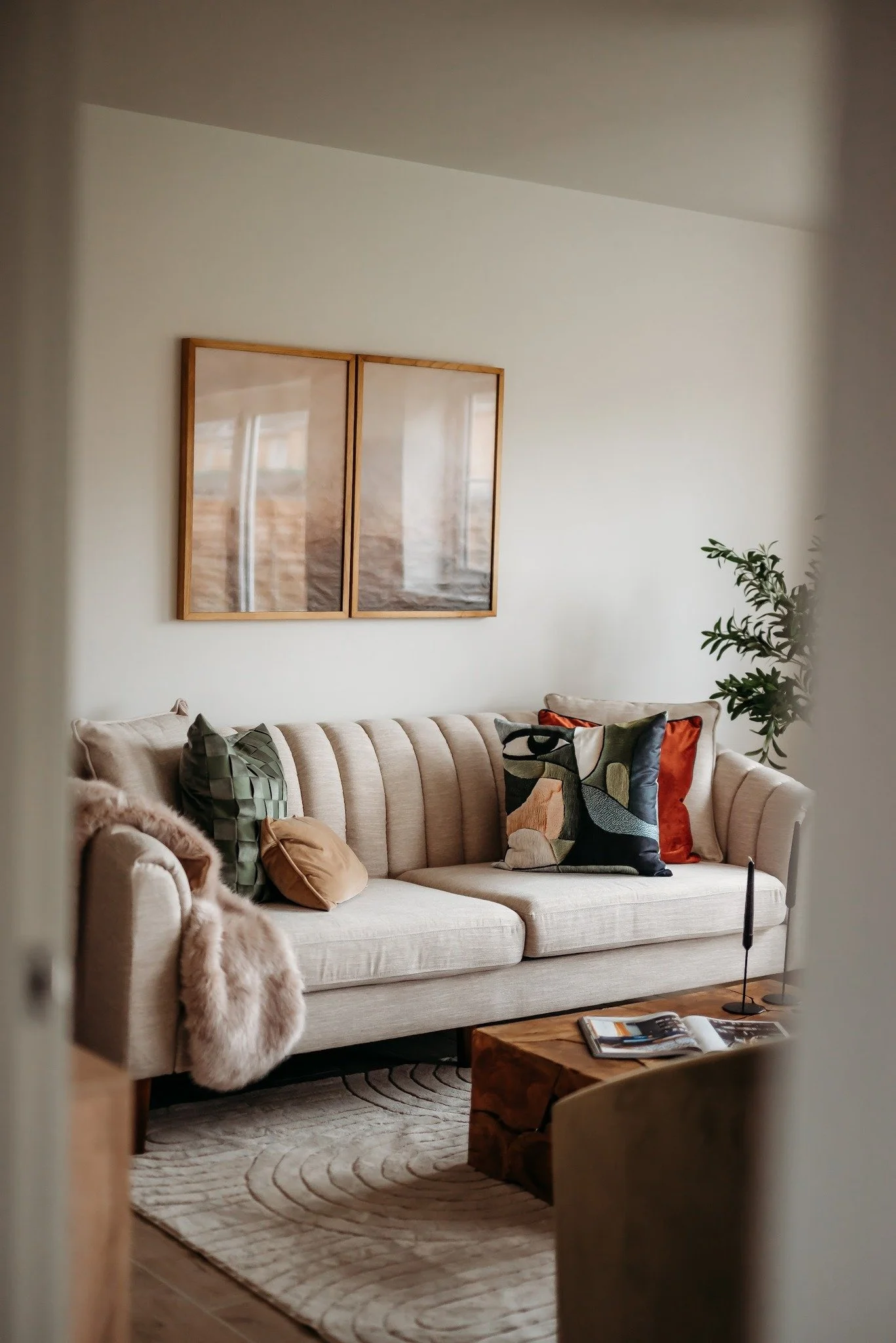 Design is intelligence made visible.
And staging is strategy made visible. 

This image is the perfect example of both.
By transforming the space with warm neutrals, intentional furniture placement, and inviting layers of texture, we helped buyers in