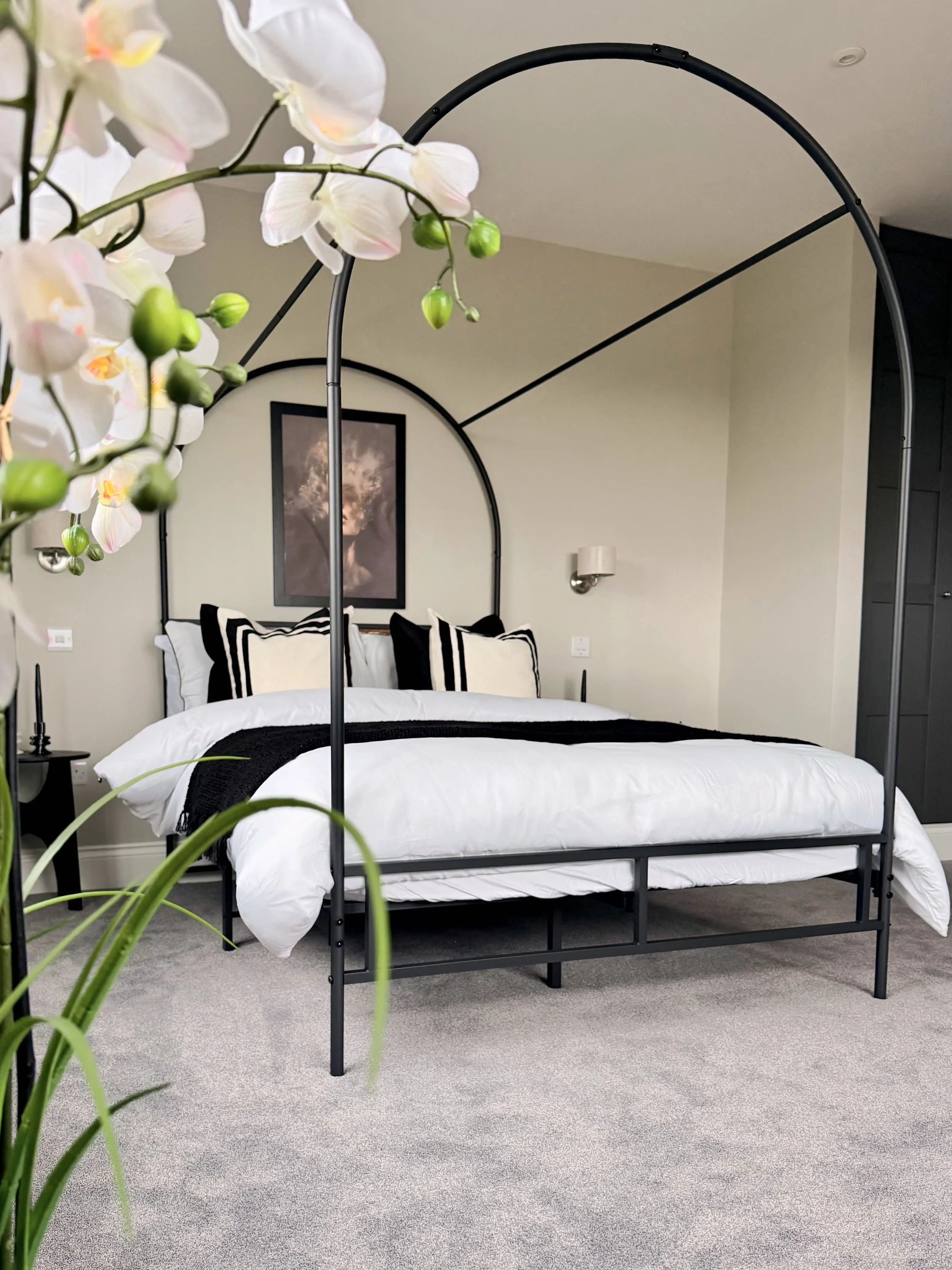 home-staging-bedroom-black-bed-moody-picture-arched-bed-swindon-wiltshire-developer-house-for-sale.jpeg