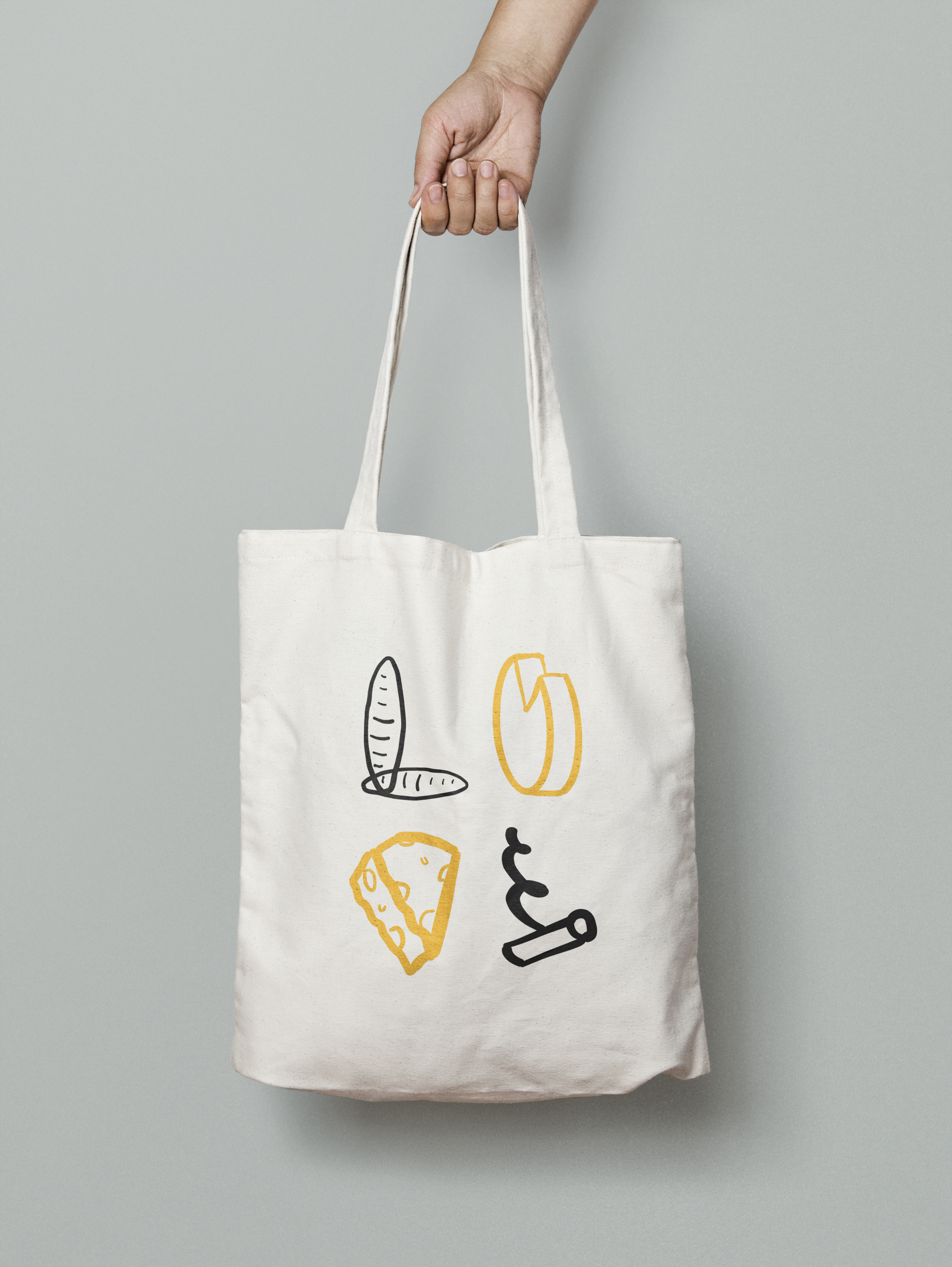 Canvas bag with illustrated "Love" using breads, cheeses, and a wine corker.