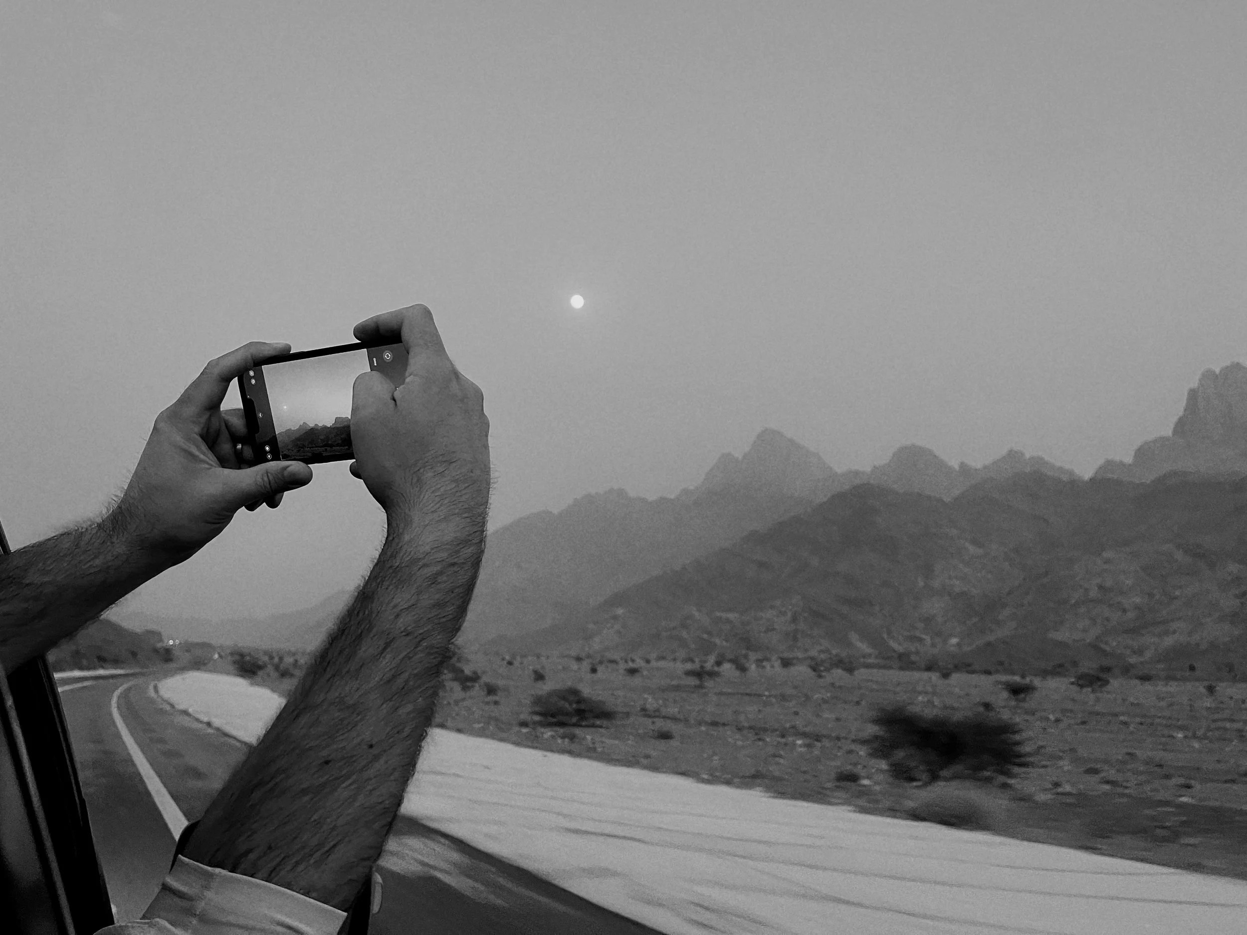  Mike Knockenhauer shooting a photo out of the window in Saudi Arabia during a dust storm. 