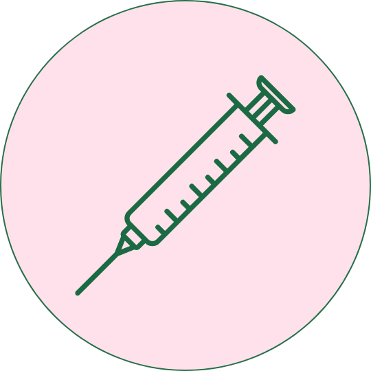 Illustration of a syringe with a needle on a pink circular background.