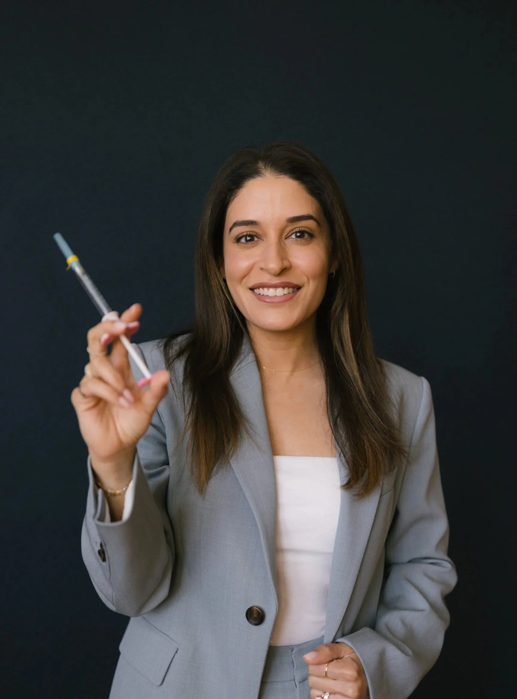 Woman getting PRF injected in her under eyes to rid dark circles.