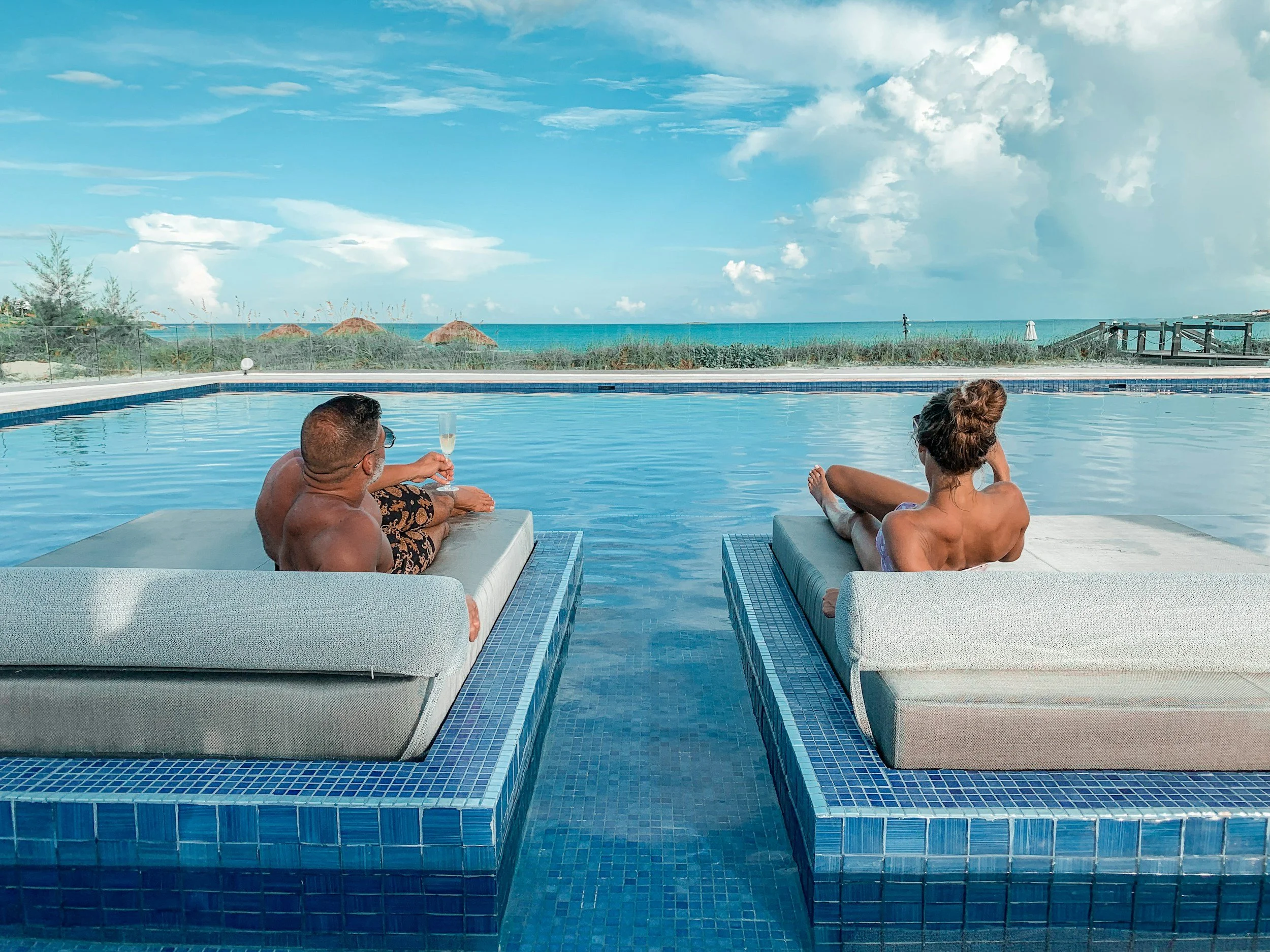 Romantic couple relaxing in a luxury resort spa