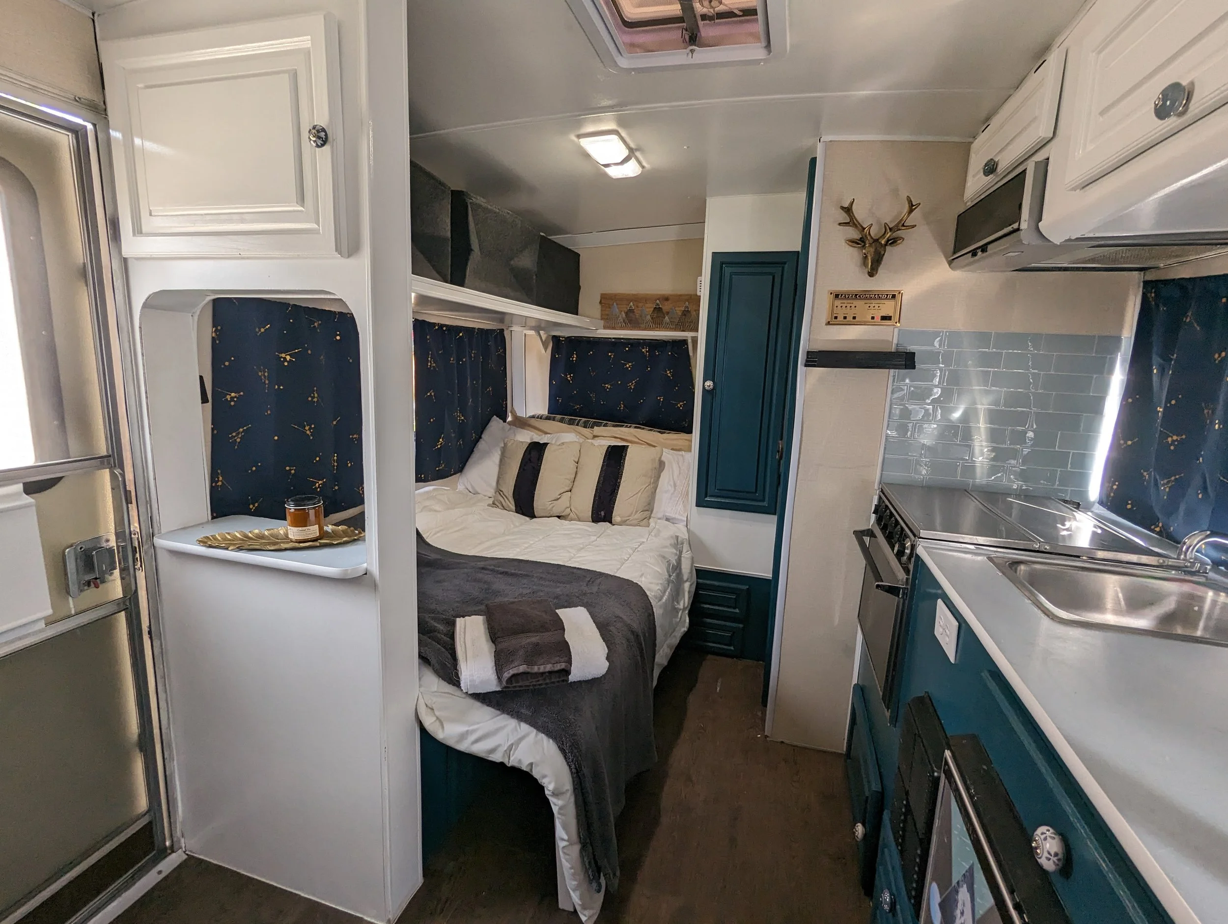 Double bed and storage overhead