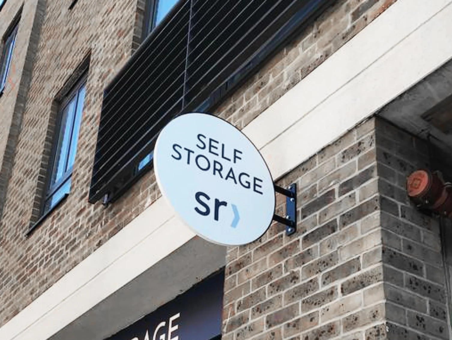 Round Projecting Signs