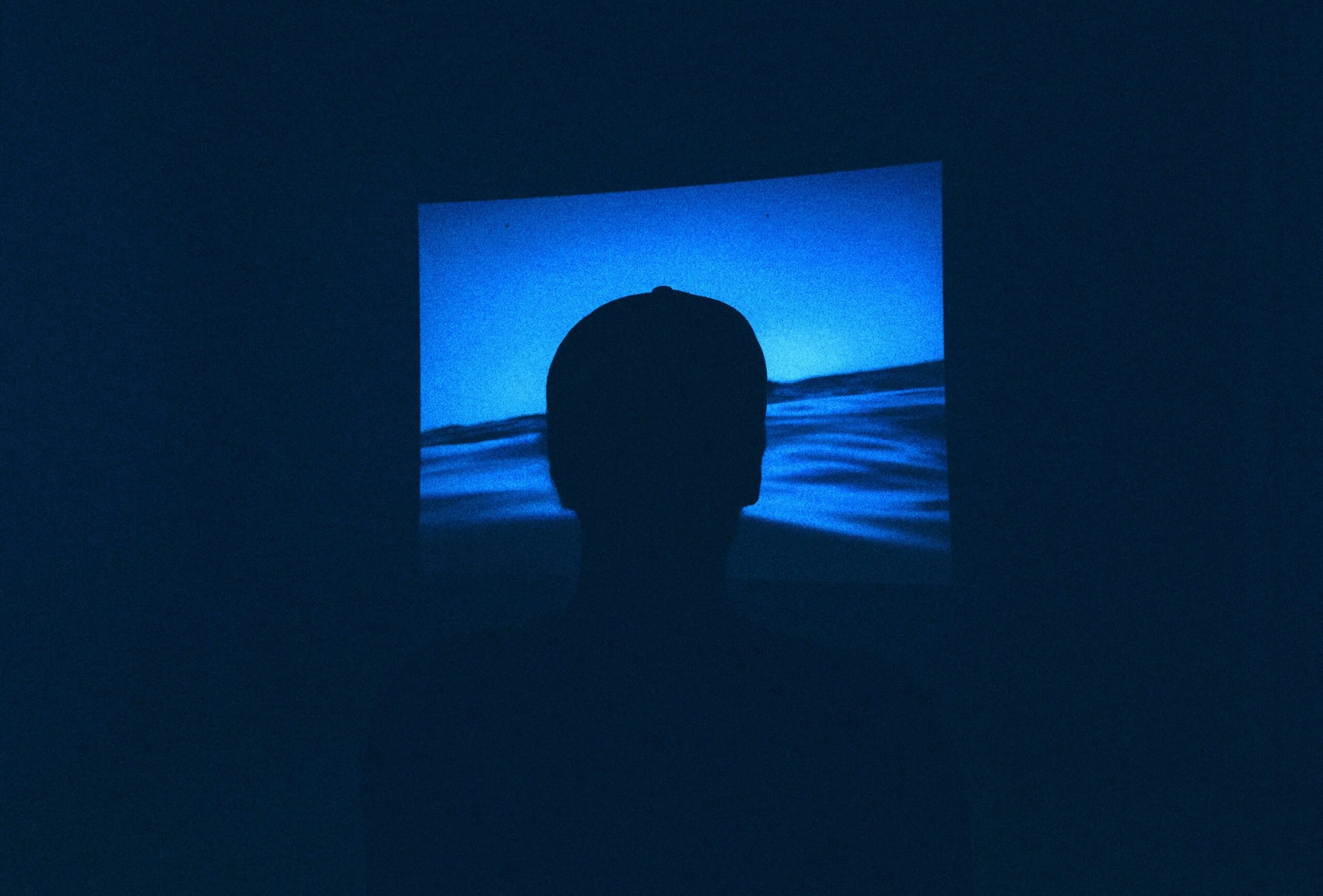 Person in front of a blue screen