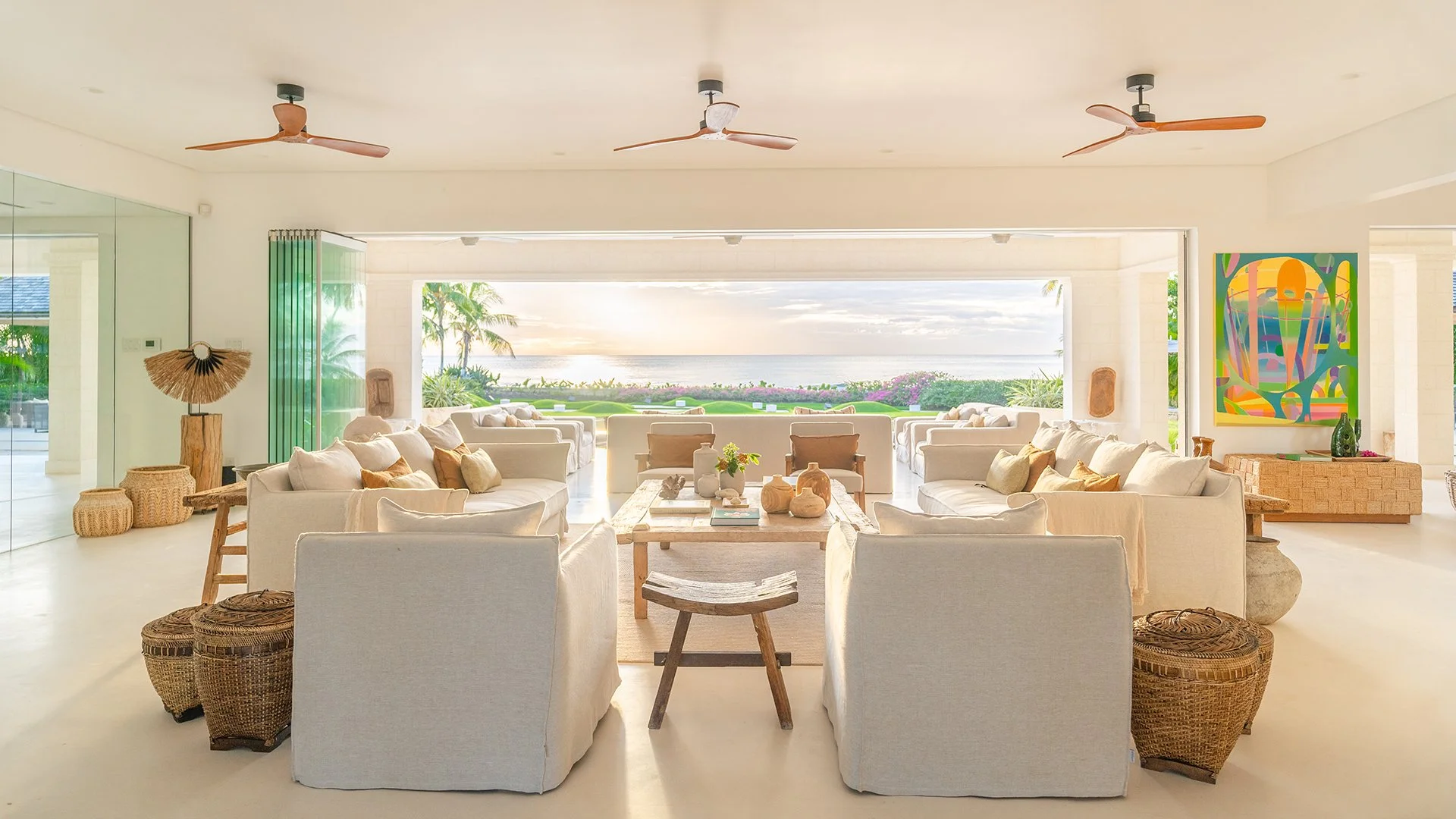 Living and dining areas are furnished with designer pieces from names such as Maxalto, Christian Liaigre and Ralph Lauren, as well as a pair of B&B Italia sofas. Enquire now for a stay at Godings Beach House with Simon Escapes.