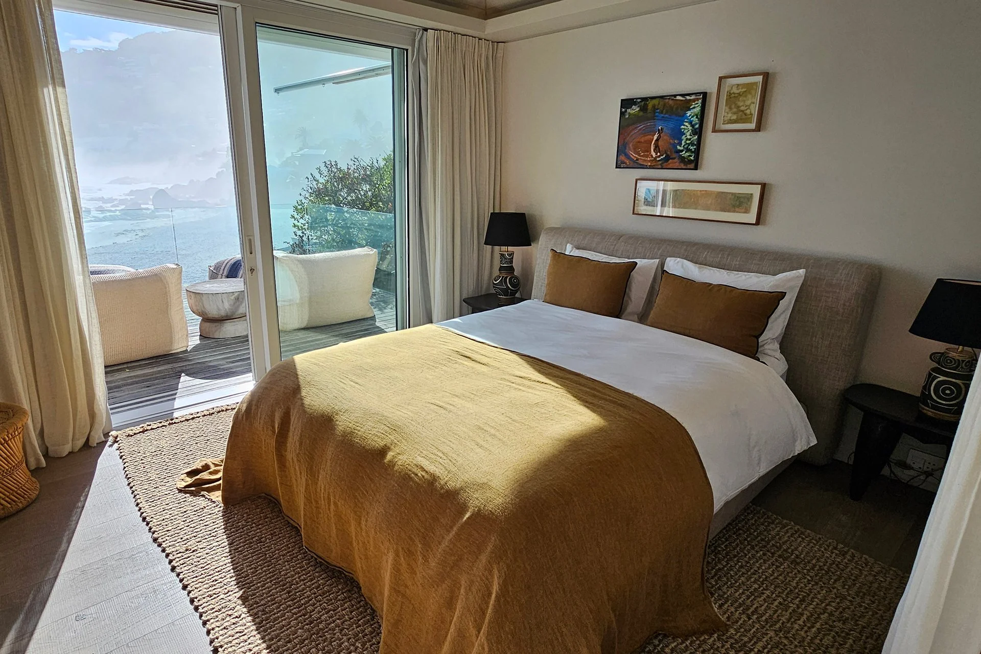 Each of the three bedrooms has an en suite bathroom, king-size bed and access to outside decked areas through floor-to-ceiling windows.