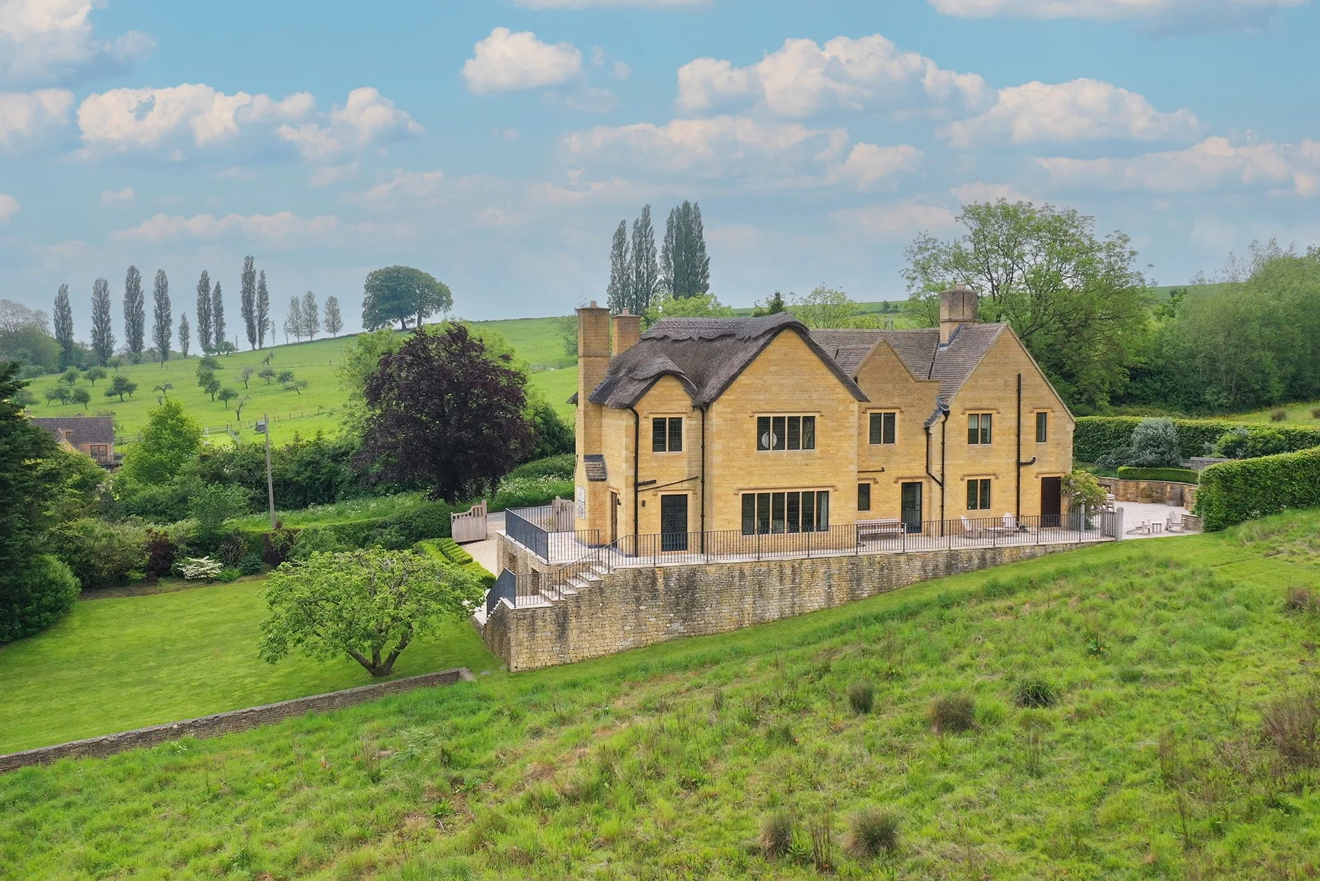 Elkstones is an elegant, thatched house in The Cotswolds, just a short walk from the picturesque town of Chipping Campden in Gloucestershire. Secure your booking at Elkstones with a luxury stay with Simon Escapes.