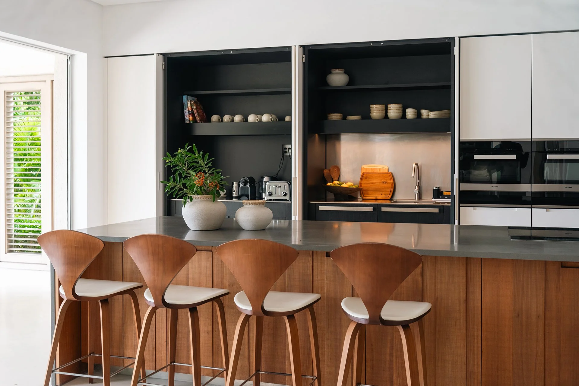 The stylish Boffi kitchen is fully equipped with all mod cons, a large breakfast table and Nespresso coffee machine.