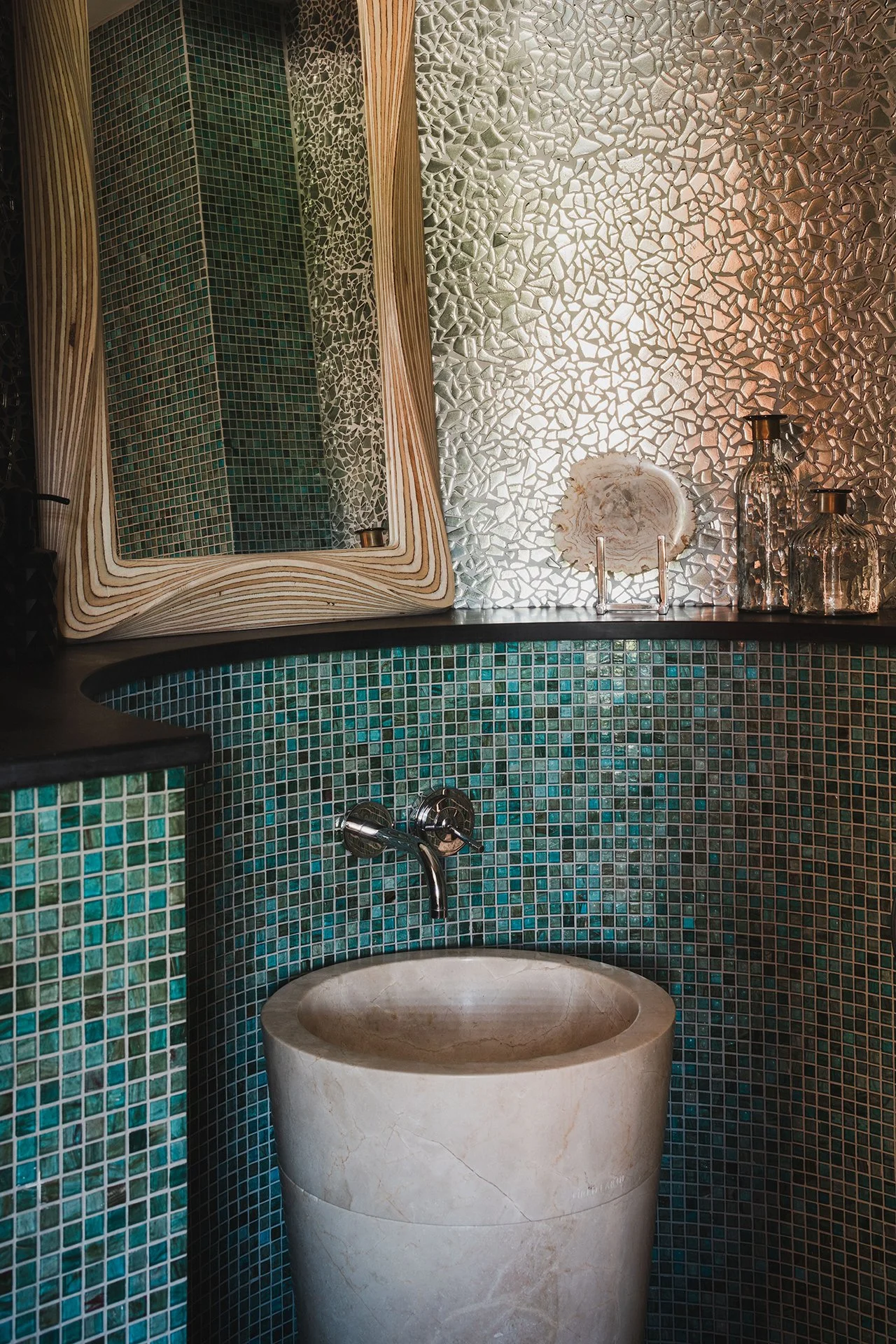 En suites have Hansgrohe deluge showers and Fired Earth and Island Stone tiles; three bedrooms have a freestanding Castello bath.