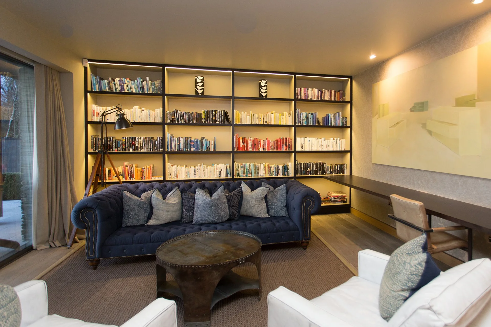 The lake house sleeps up to 10 guests in five bedrooms with interiors features such as decorative antlers, warm plaid fabrics and faux fur rugs contributing to its ski chalet/hunting lodge vibe.