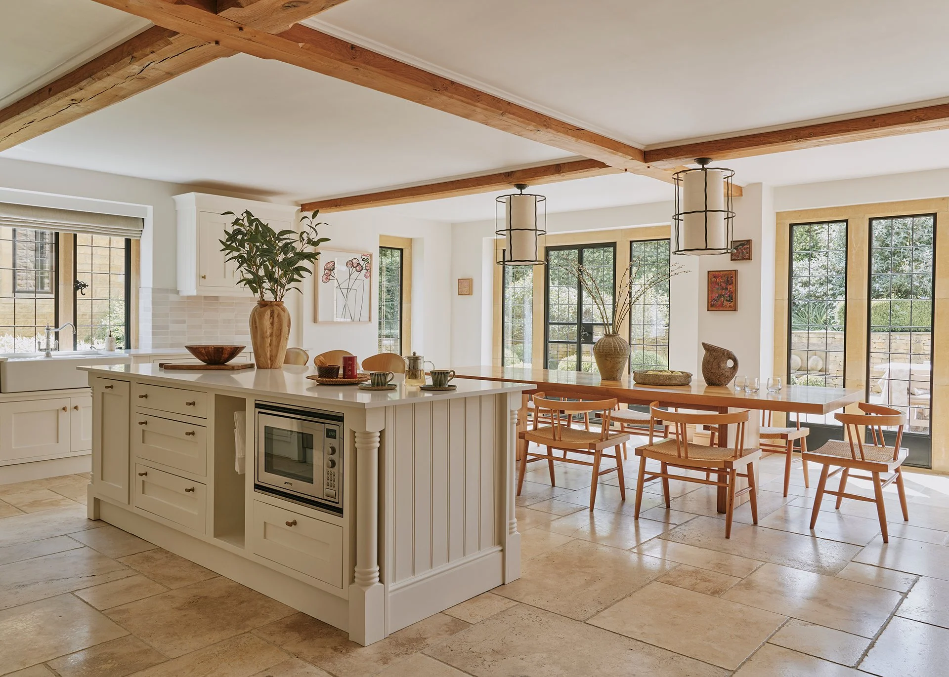 

At the heart of the house is the stylish Loxleys oak kitchen. Features include beams and limestone flooring, granite worktops, a seven-ring gas range with griddle, two large ovens (one perfect for pizza and bread baking), a combination oven, microw
