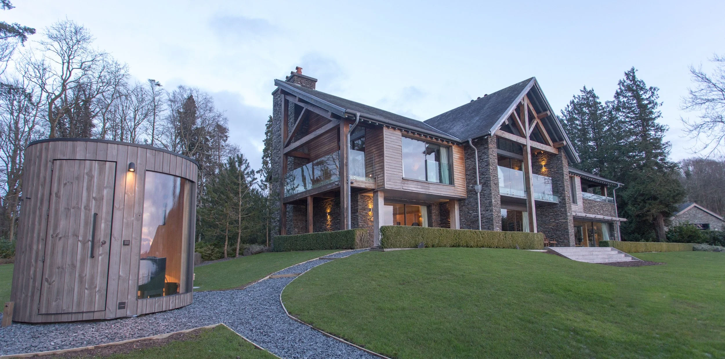 Outside, there's a generous terrace for dining and relaxing, the gardens and a jetty where you can tie up a boat or kayak, enjoying direct access to Lake Windermere. Two perfectly positioned architect designed lumipods provide a wellness haven. 