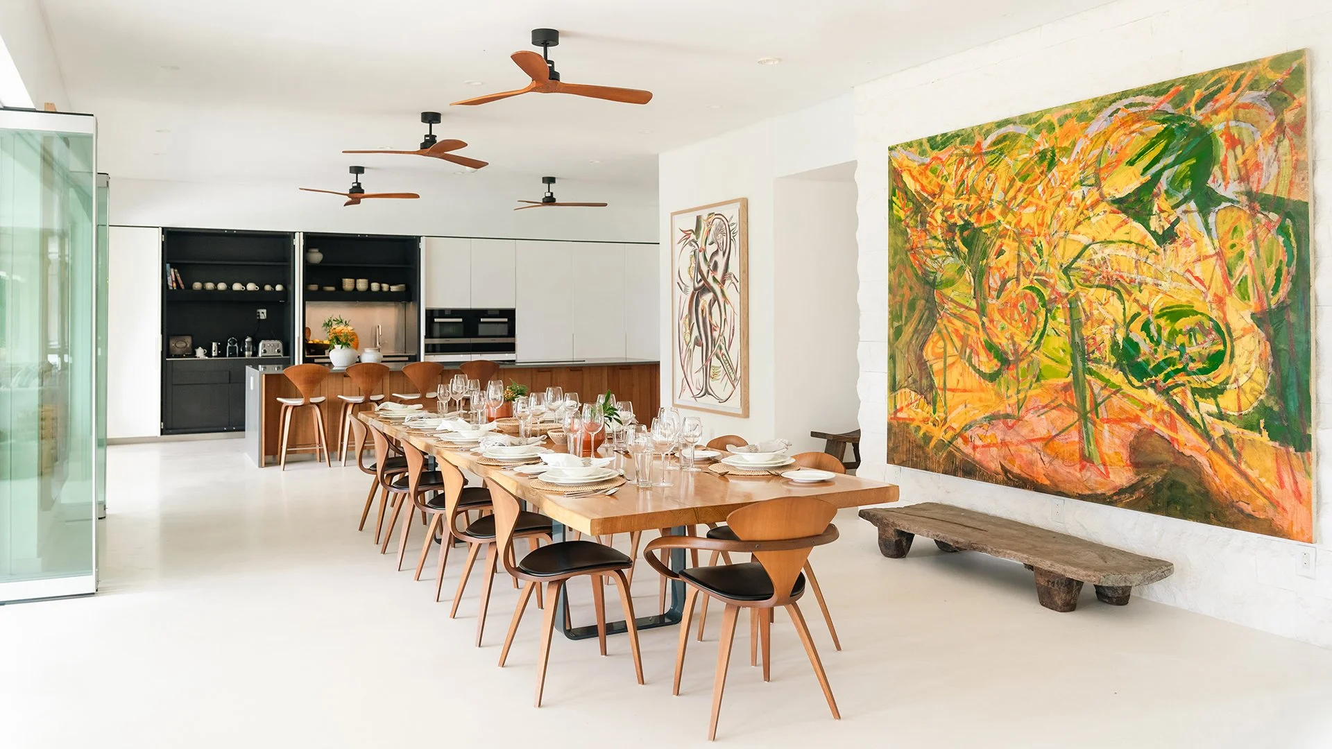 Dining options included around the grand bespoke Whetstone Oak dining table or al fresco in two shaded dining areas. A personal cook will tailor menus, using the designated chef's kitchen. Book your stay at Godings, Barbados with Simon Escapes.