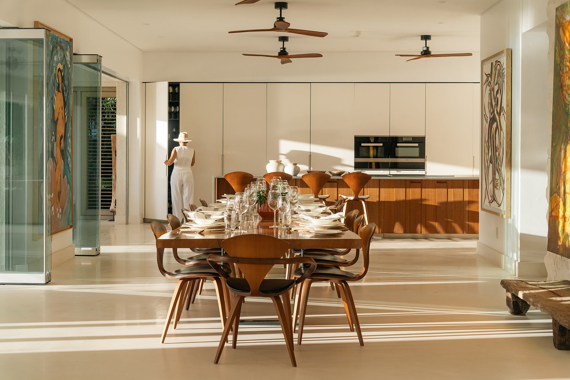 Dining options included around the grand bespoke Whetstone Oak dining table or al fresco in one of two shaded dining areas A personal cook will tailor menus, using the designated chef's kitchen.
