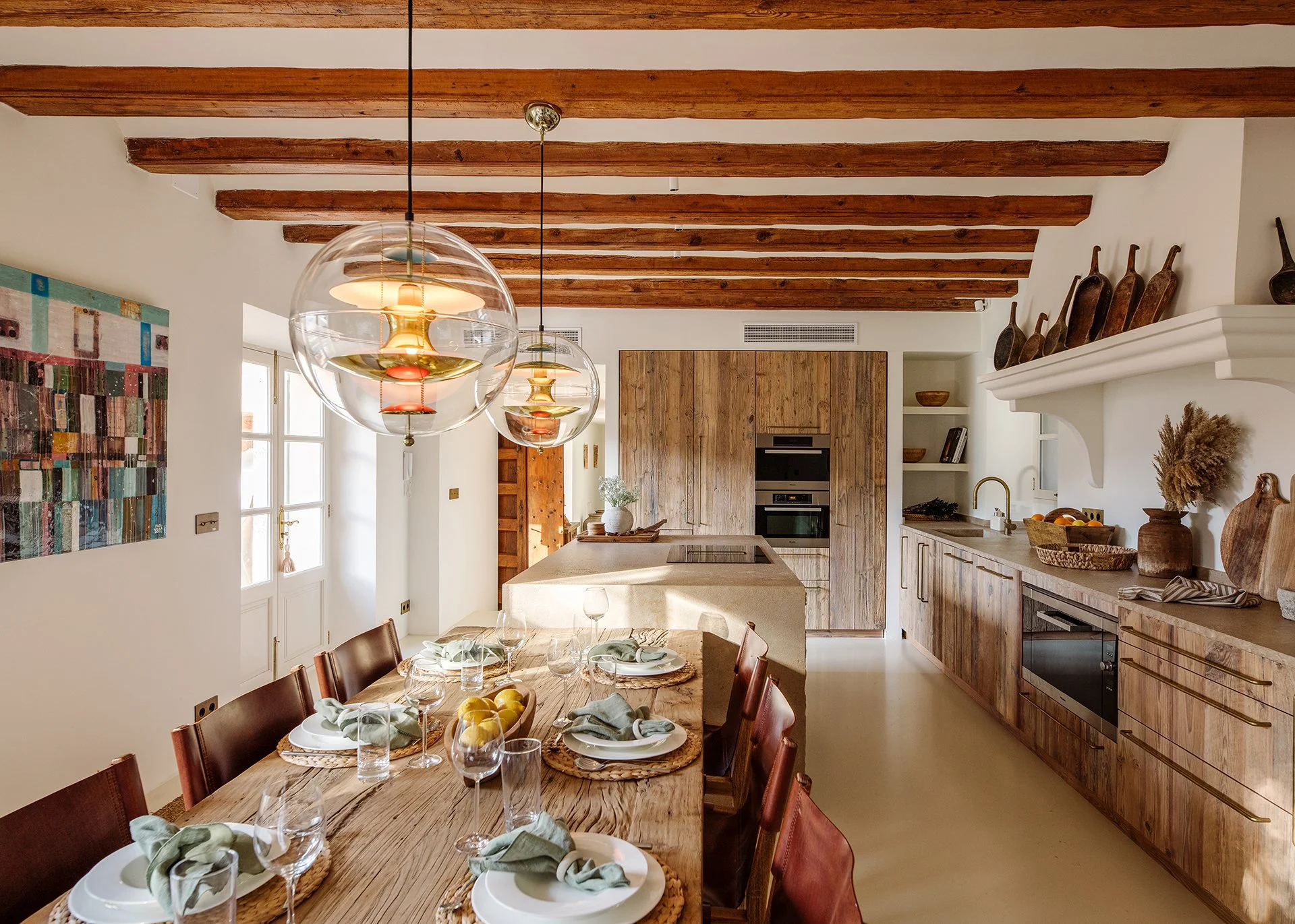 Equipped with state-of-the-art Miele appliances including induction hob, double oven, microwave, coffee machine, dishwasher, larder fridge and freezer. Utility room with wine storage, extra fridge and freezer. 