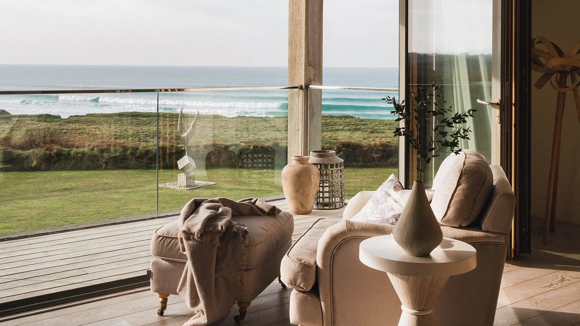 The interiors style has been created by Jill Stein and is coastal-hip, with driftwood features, oversized storm lanterns, locally sourced art and sculptures and designer furnishings.