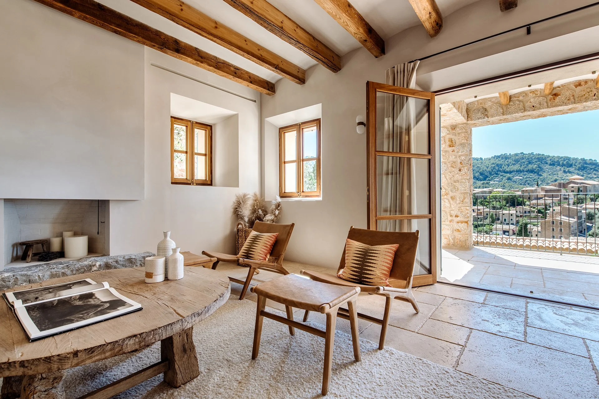 Sunlight floods the open-plan living areas, highlighting pieces by renowned designers, along with state-of-the-art appliances to make each stay as comfortable as possible.