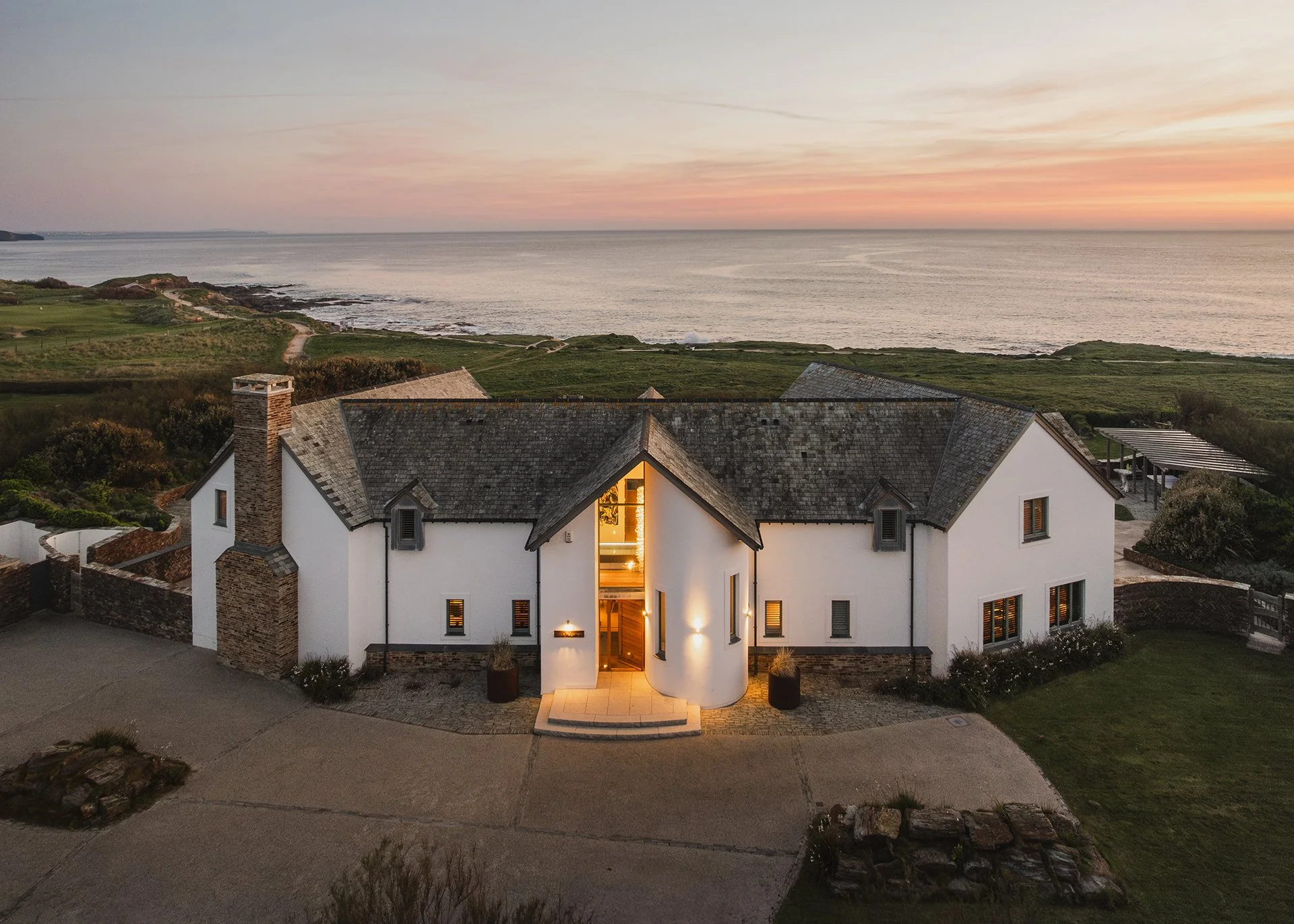 Swathed in glass and timbered gables, Little Polgarron is the ultimate Cornish beach house accommodating up to 10 guests and located next to the prestigious Trevose Head golf course and just a few minutes' walk from the beach at Booby's Bay. This is 