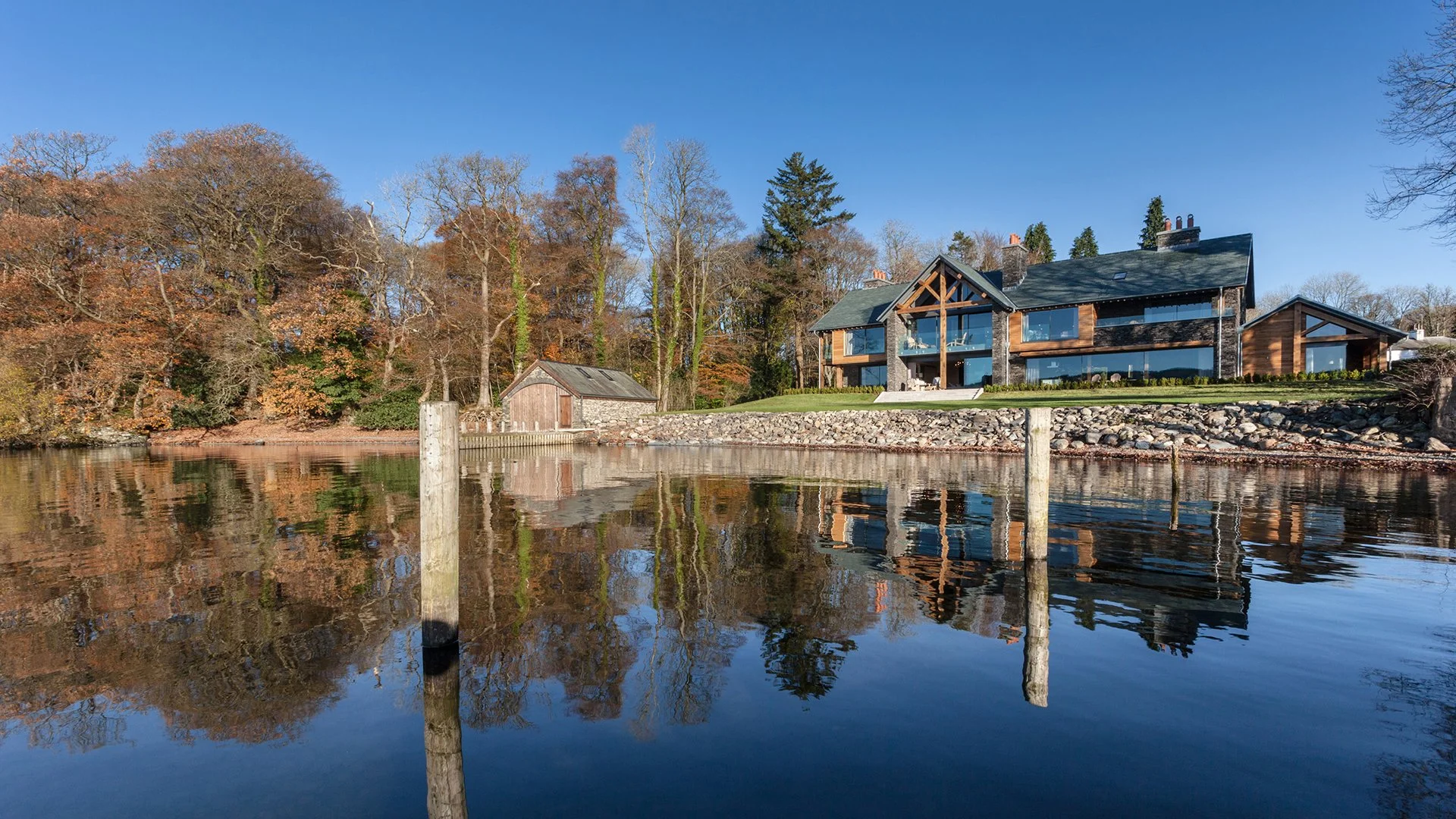 This impressive, ski chalet-style house sits directly on Lake Windermere, a short drive from Bowness. Boasting uninterrupted lake views and its own jetty, Grey Gables features a home cinema room and a games room with 8ft pool table. 