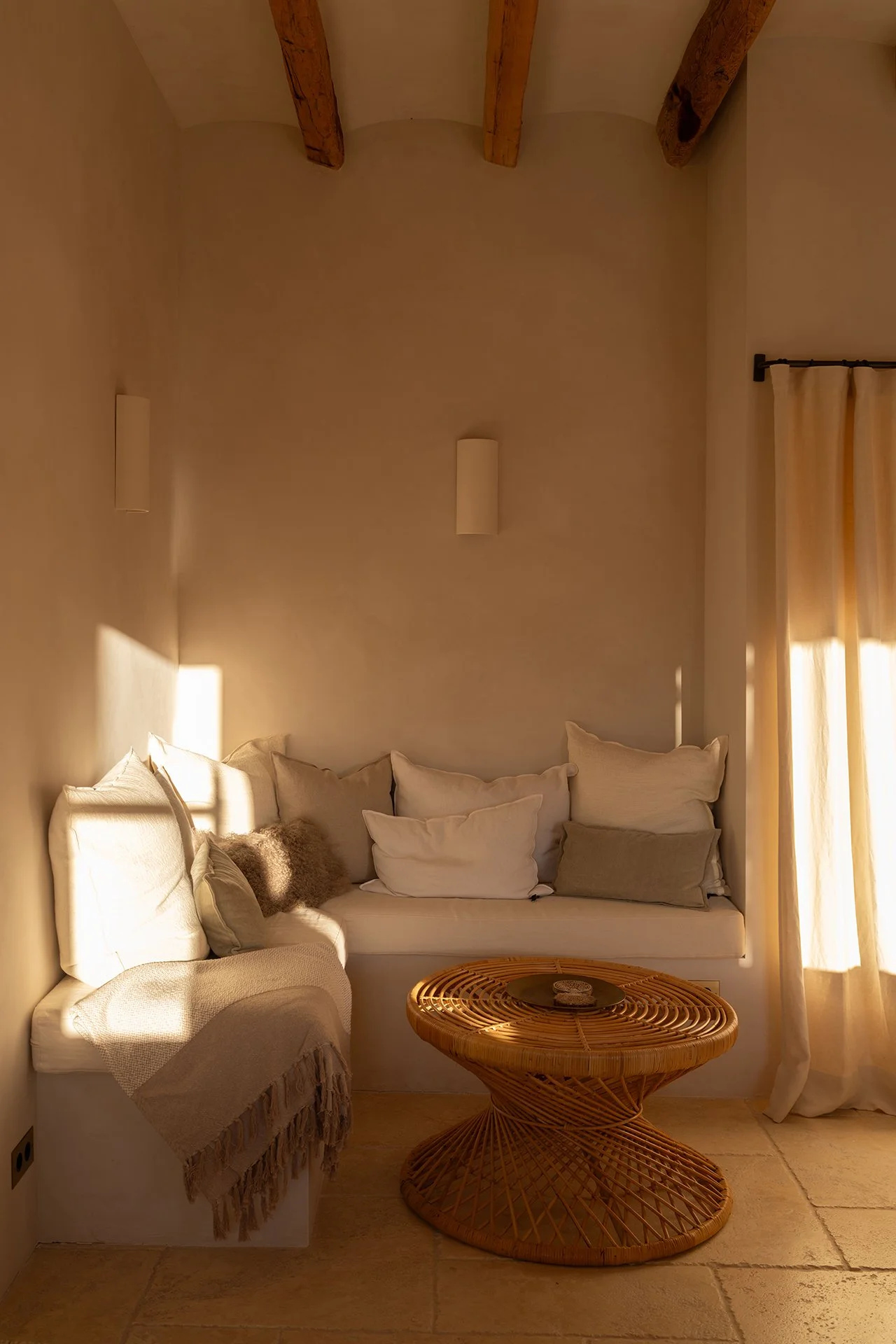 Sunlight floods the open-plan living areas, highlighting pieces by renowned designers, along with state-of-the-art appliances to make each stay as comfortable as possible.