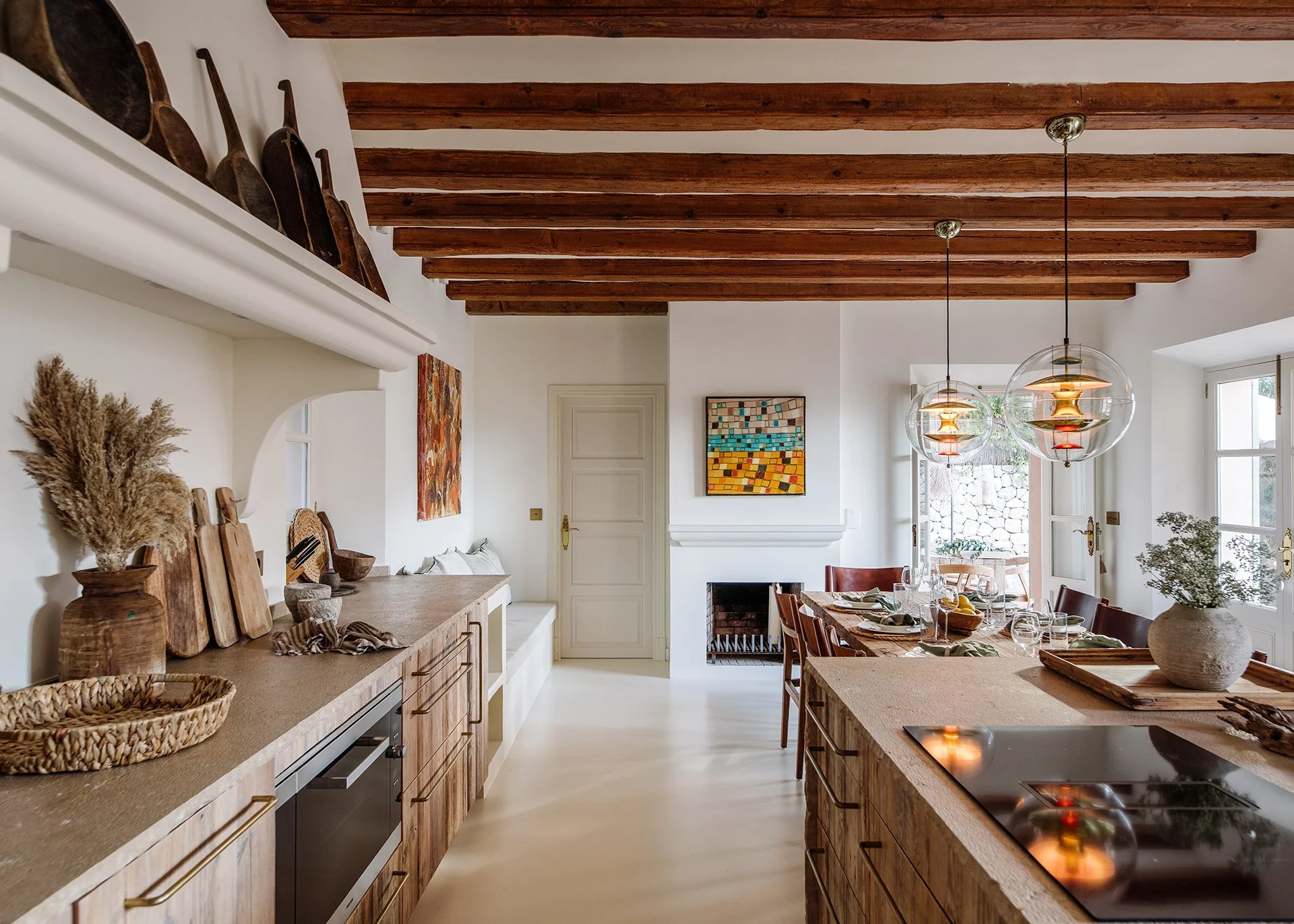 Equipped with state-of-the-art Miele appliances including induction hob, double oven, microwave, coffee machine, dishwasher, larder fridge and freezer. Utility room with wine storage, extra fridge and freezer. 