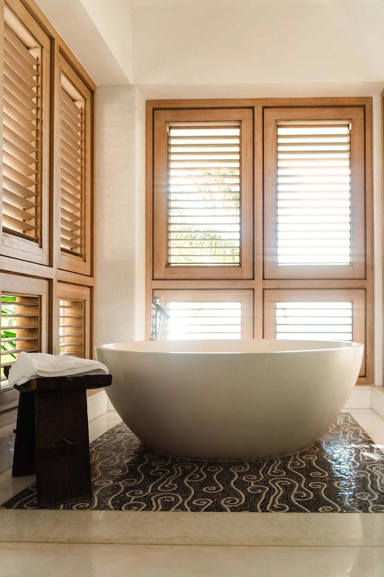 Each bedroom has a walk-in dressing room, private terrace and luxury bathroom furnished with Hansgrohe rain shower, mosaic tiles from Ann Sacks and marble vanities.