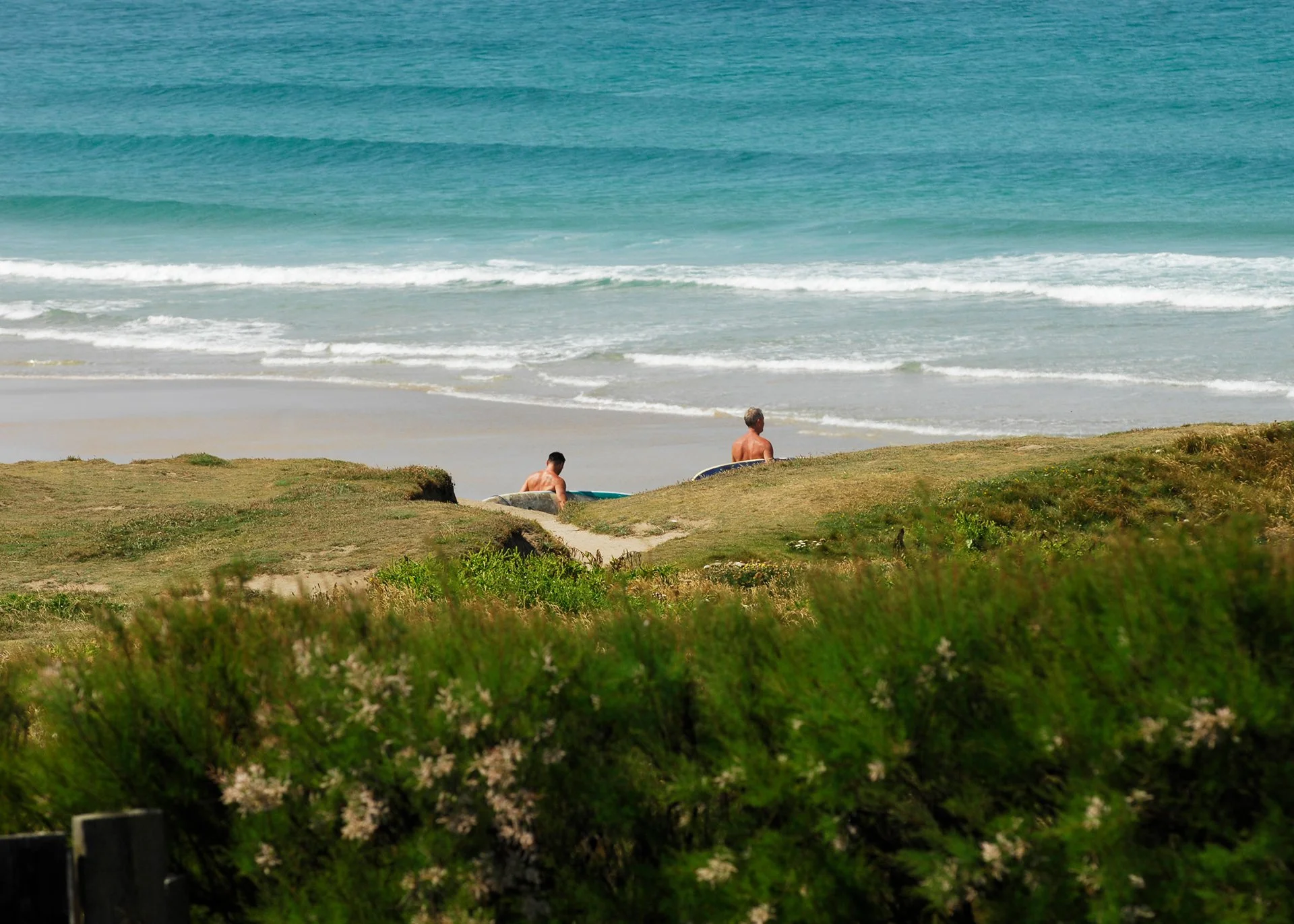 Outside, an acre of garden includes a terrace with sun loungers and a BBQ area. A gate gives direct access to the South West Coastal Path and the beach.