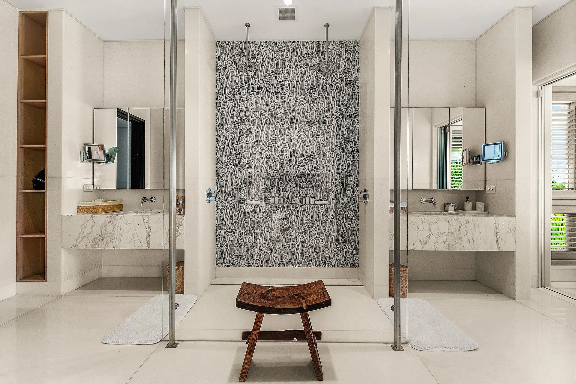Each bedroom has a walk-in dressing room, private terrace and luxury bathroom furnished with Hansgrohe rain shower, mosaic tiles from Ann Sacks and marble vanities.