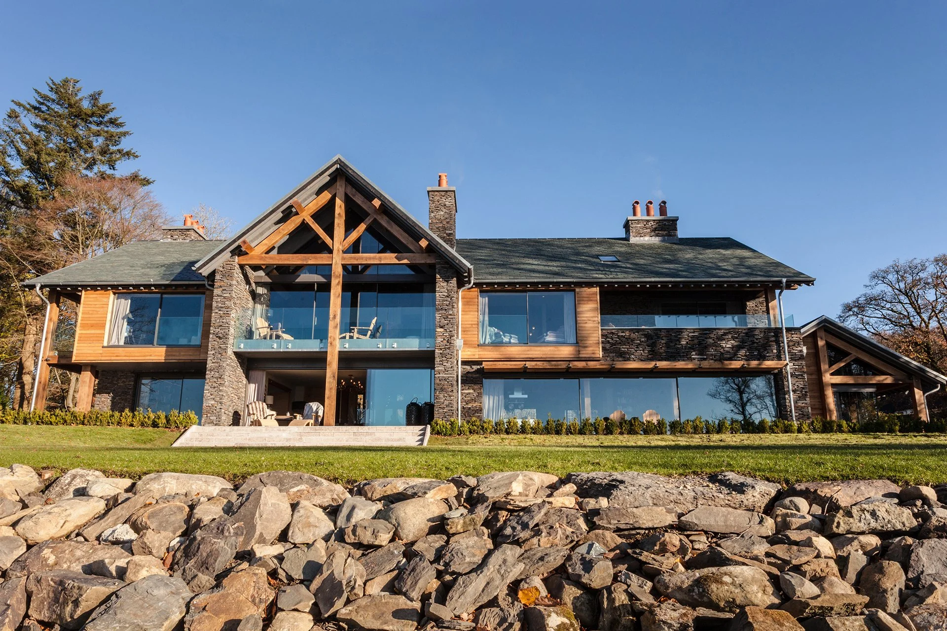 Sitting on the shore of Lake Windermere, Grey Gables is an impressive and luxurious Lakeland-stone home with incredible views and a range of special extras, including lumipod design-led gym and sauna with Lake views, a home cinema and games room.