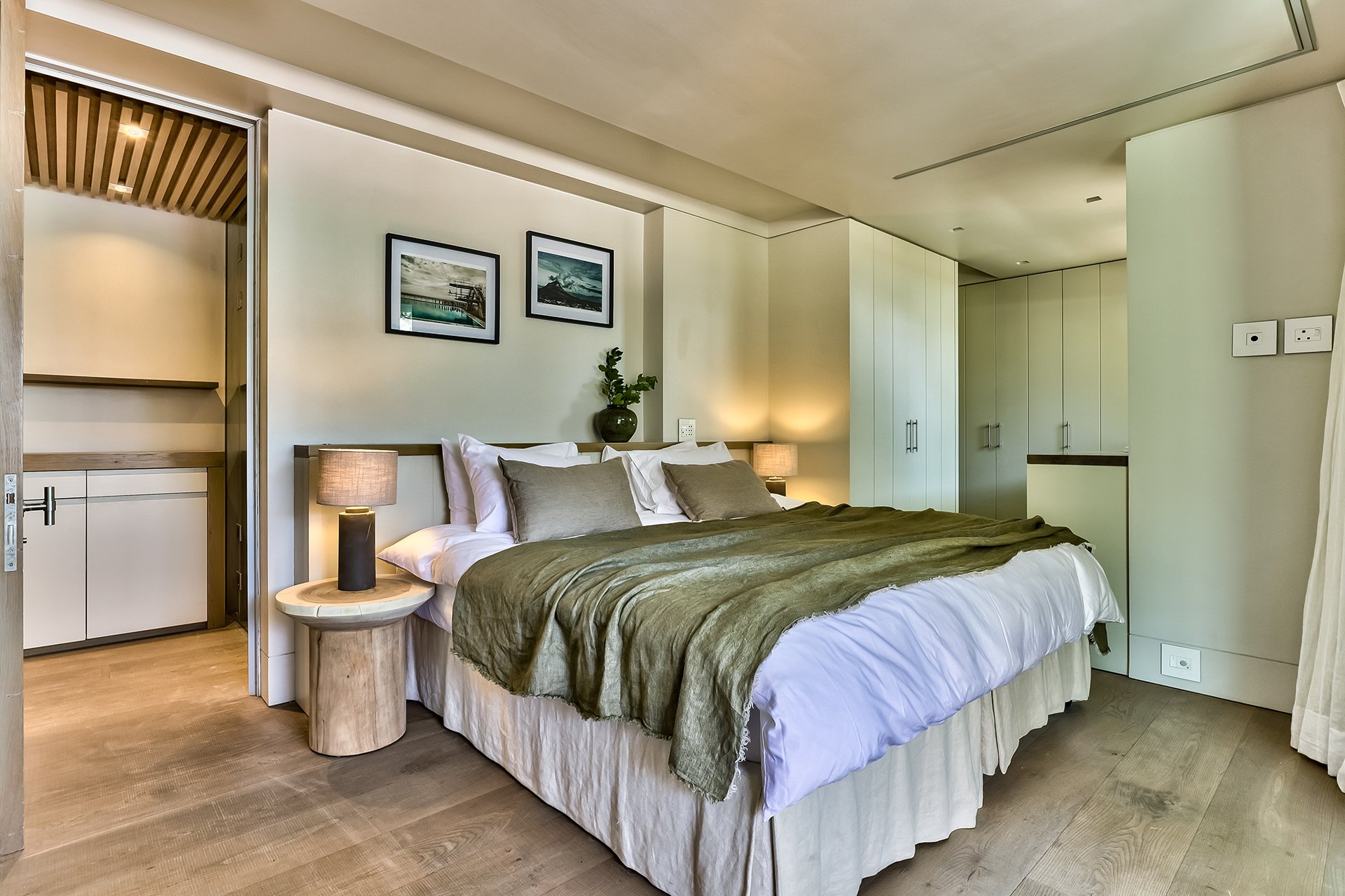 Each of the three bedrooms has an en suite bathroom, king-size bed and access to outside decked areas through floor-to-ceiling windows.