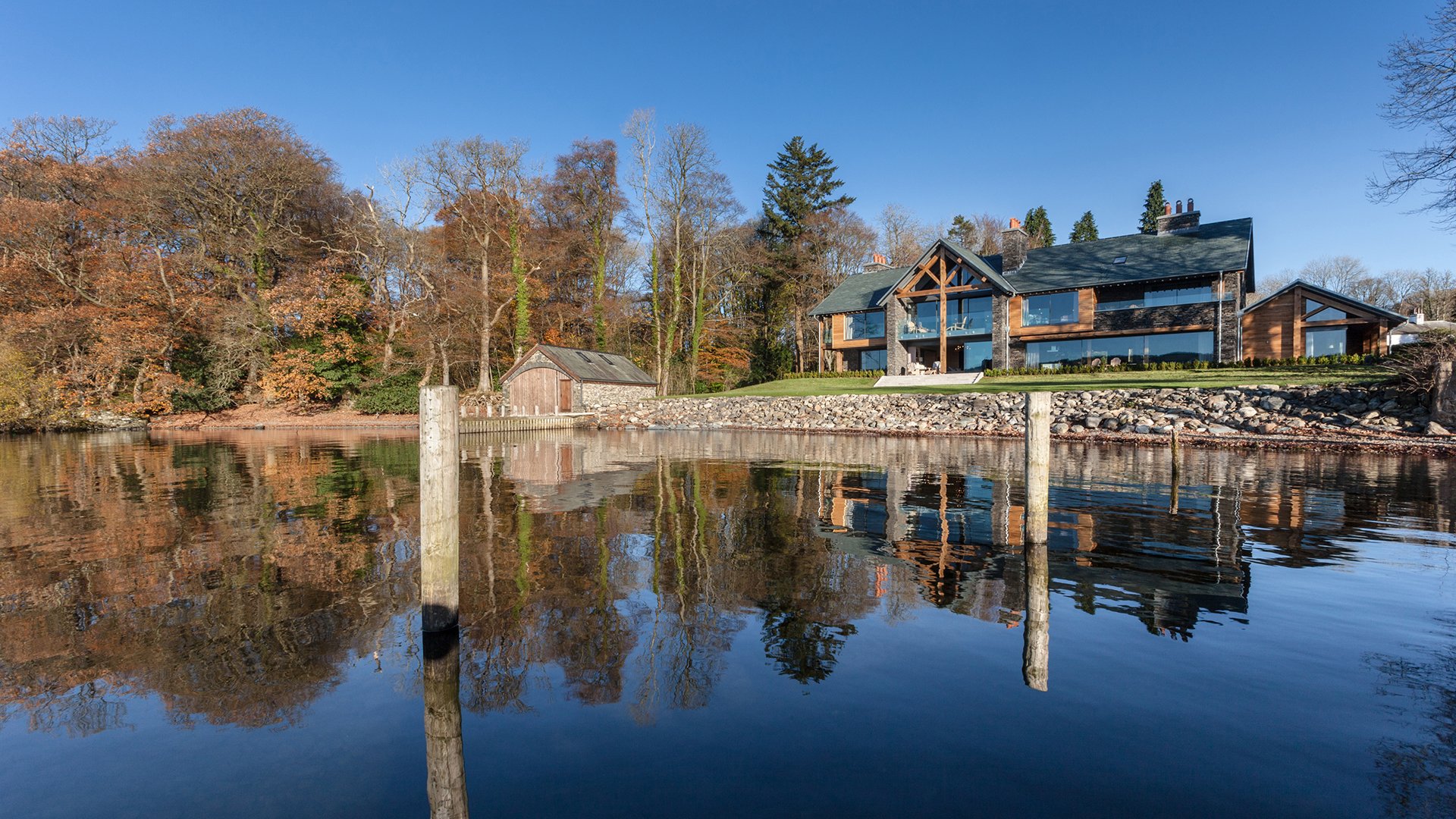 Sitting on the shore of Lake Windermere, Grey Gables is an impressive and luxurious Lakeland-stone home with incredible views and a range of special extras, including lumipod design-led gym and sauna with Lake views, a home cinema and games room. 