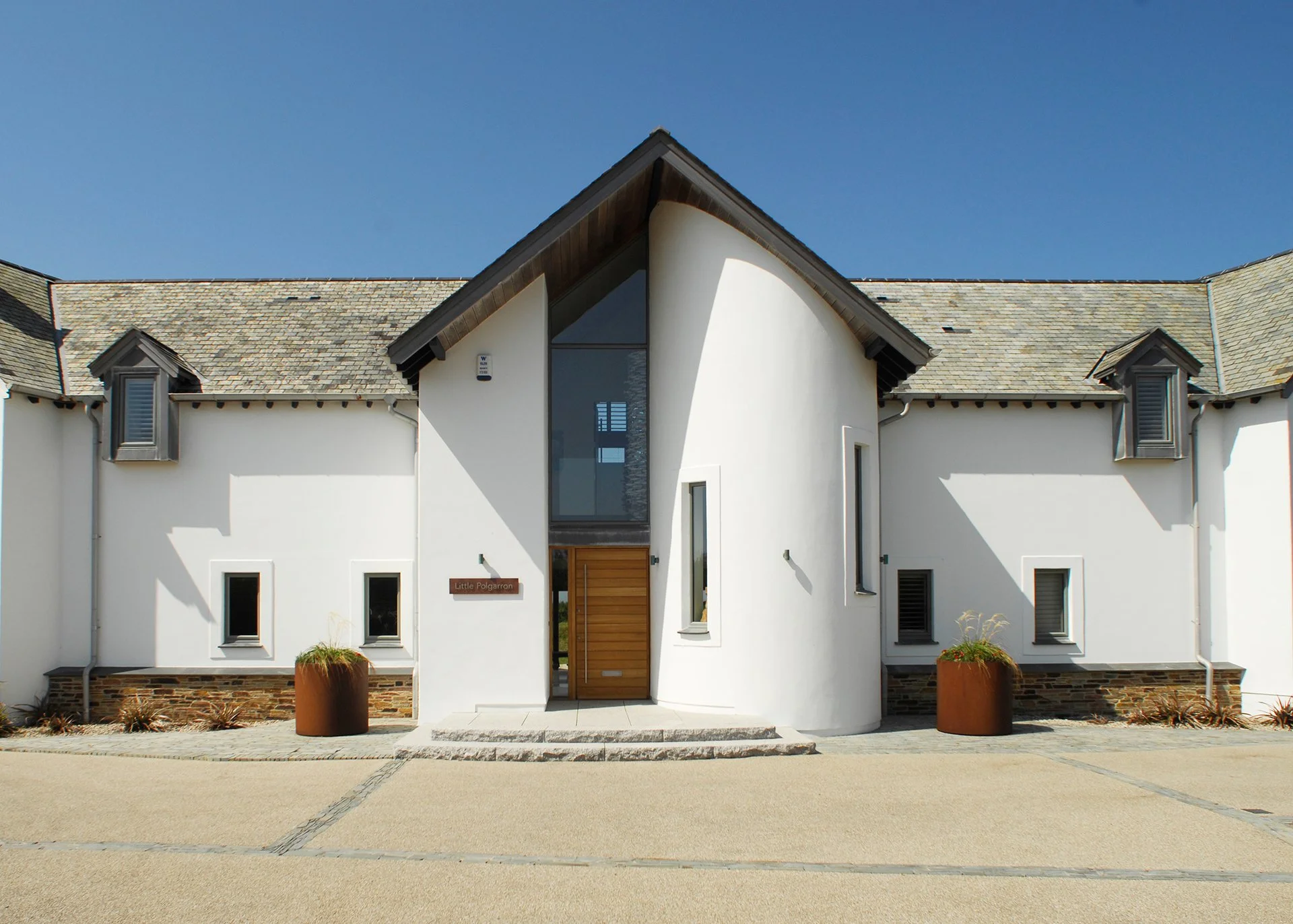 Swathed in glass and timbered gables, Little Polgarron is the ultimate Cornish beach house accommodating up to 10 guests and located next to the prestigious Trevose Head golf course and just a few minutes' walk from the beach at Booby's Bay. This is 