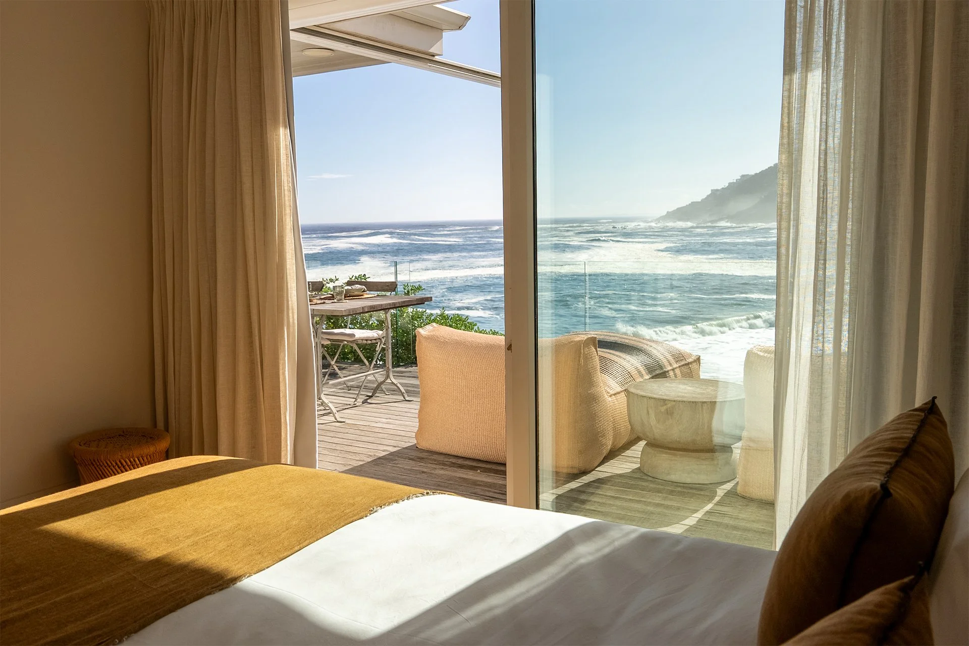 Each of the three bedrooms has an en suite bathroom, king-size bed and access to outside decked areas through floor-to-ceiling windows.