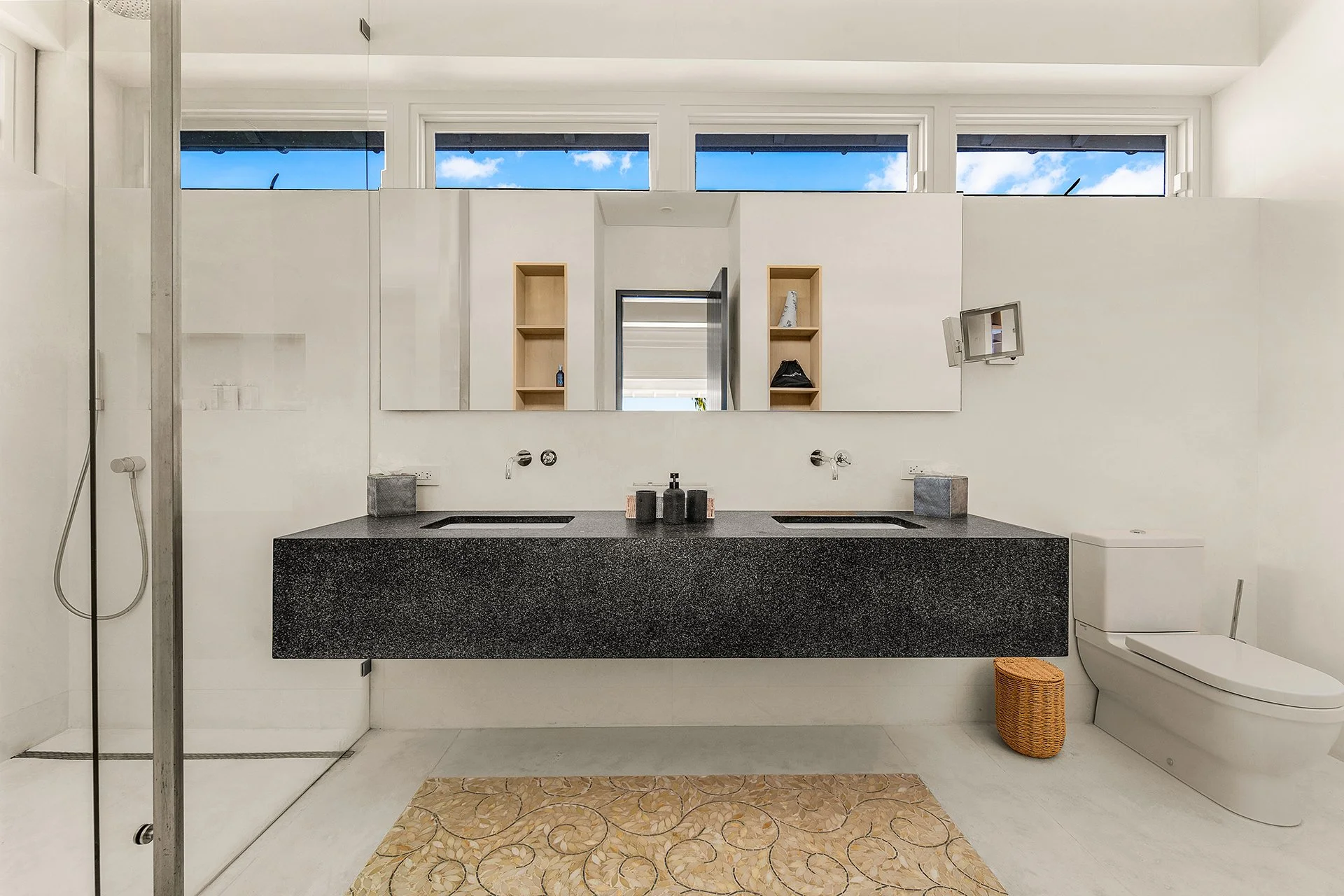 Each bedroom has a walk-in dressing room, private terrace and luxury bathroom furnished with Hansgrohe rain shower, mosaic tiles from Ann Sacks and marble vanities.