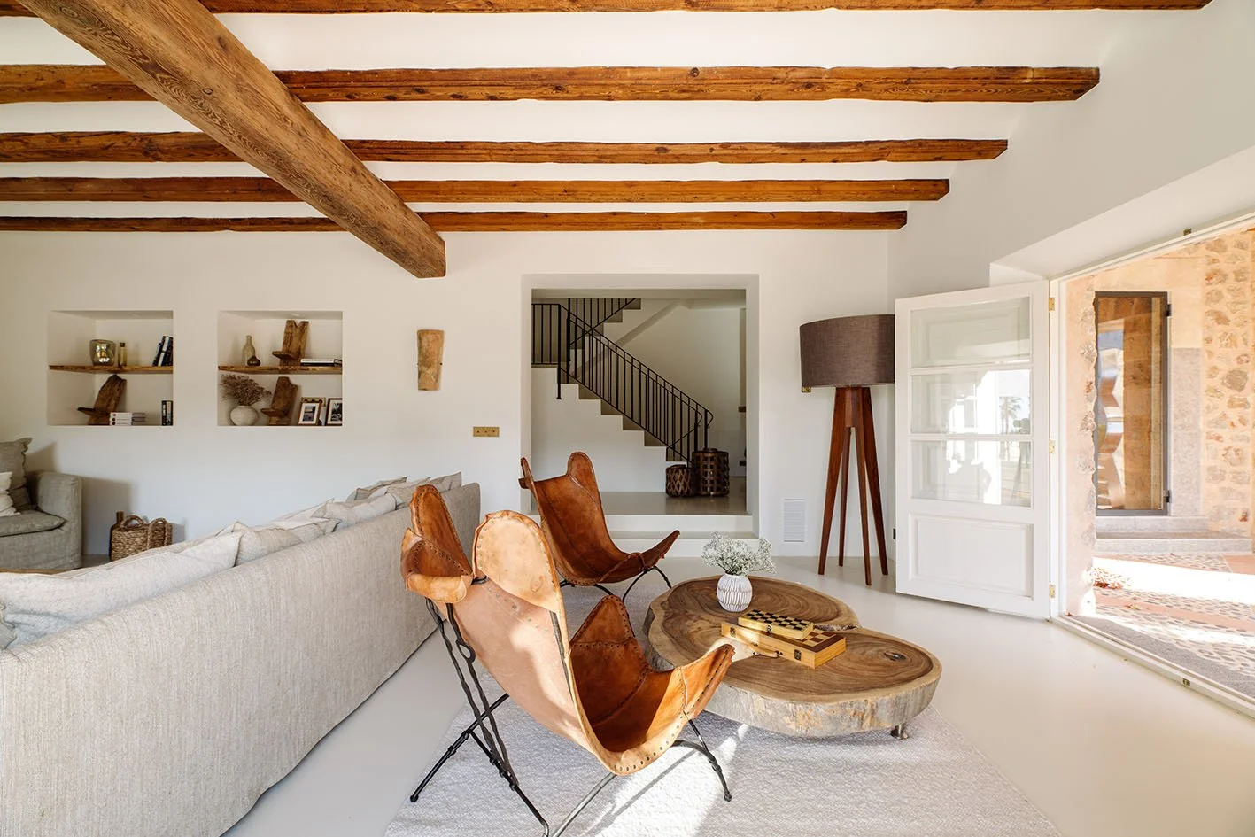 leather chairs white living room